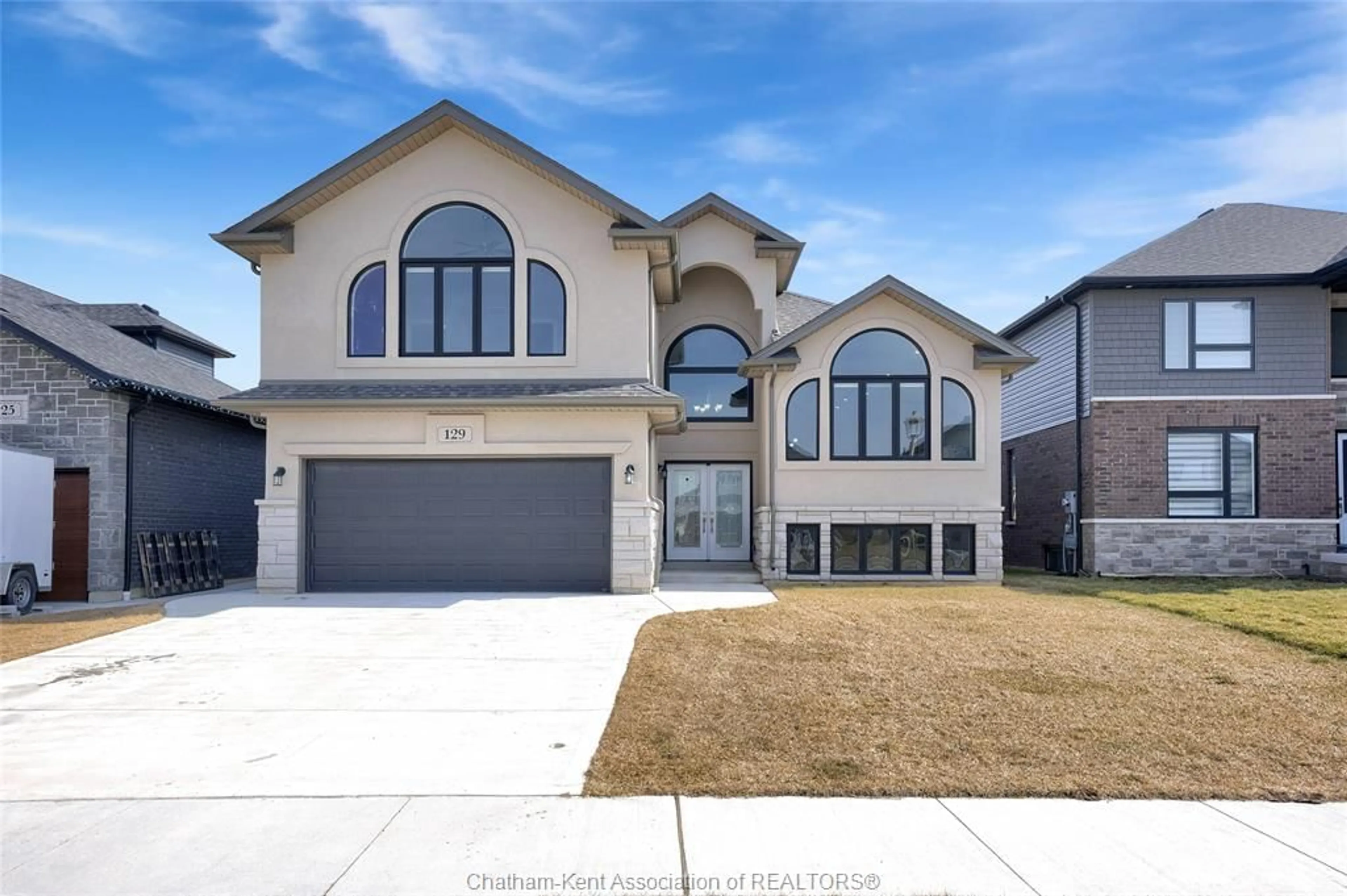 Home with brick exterior material, street for 129 TUSCANY Trail, Chatham Ontario N7M 0R9