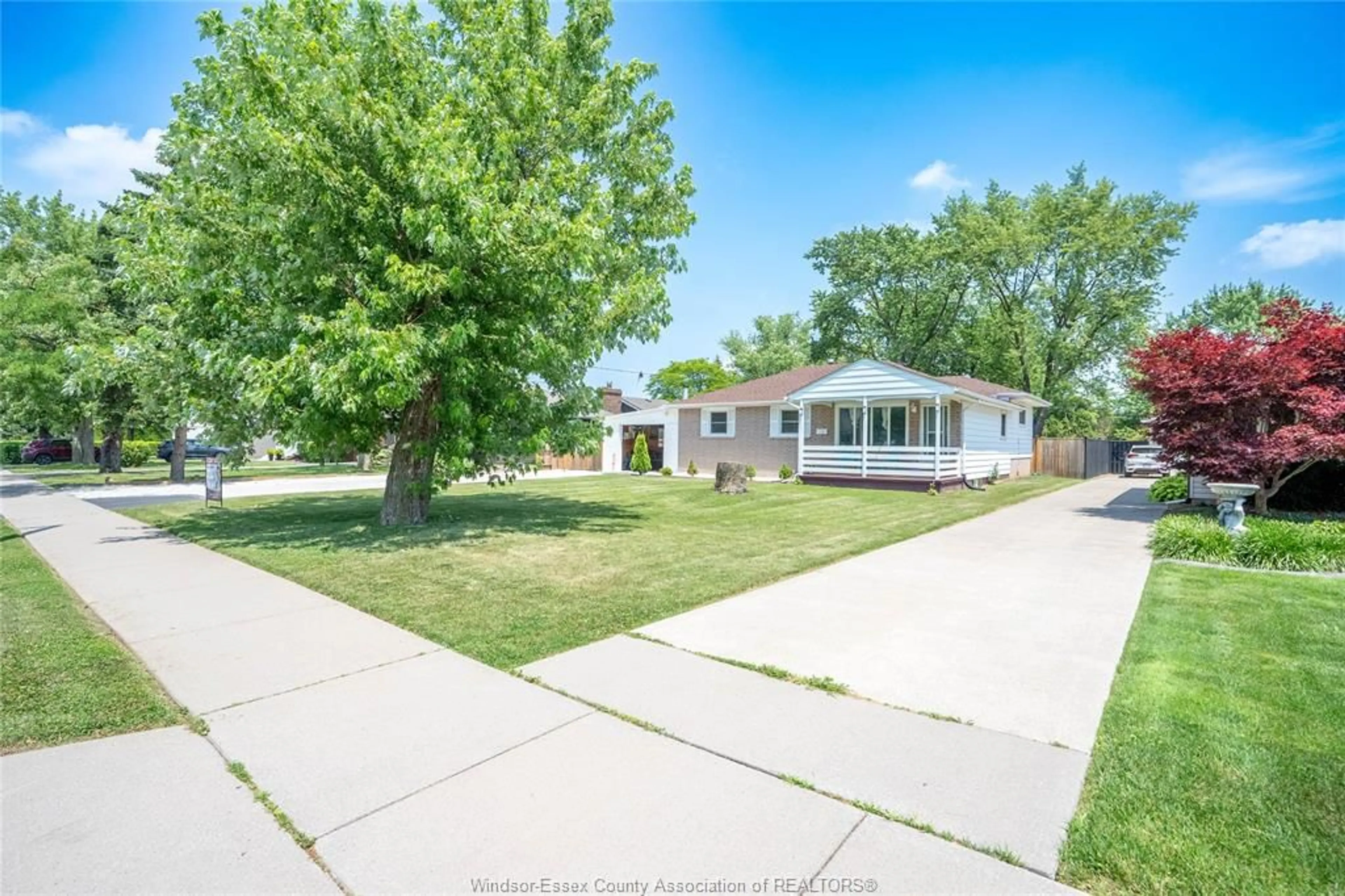 A pic from outside/outdoor area/front of a property/back of a property/a pic from drone, street for 1236 SHAWNEE Rd, Tecumseh Ontario N8N 1R9
