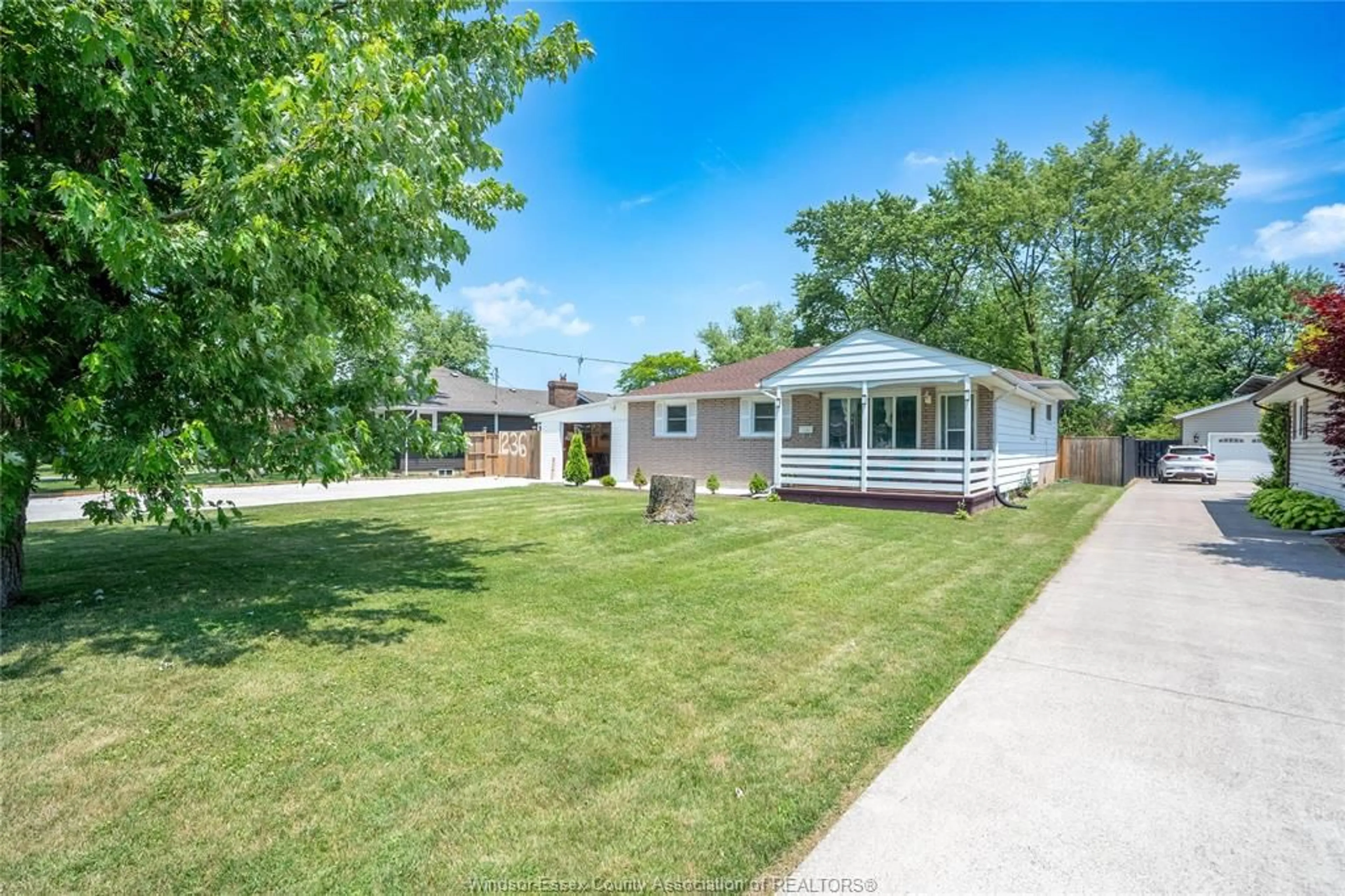 A pic from outside/outdoor area/front of a property/back of a property/a pic from drone, street for 1236 SHAWNEE Rd, Tecumseh Ontario N8N 1R9