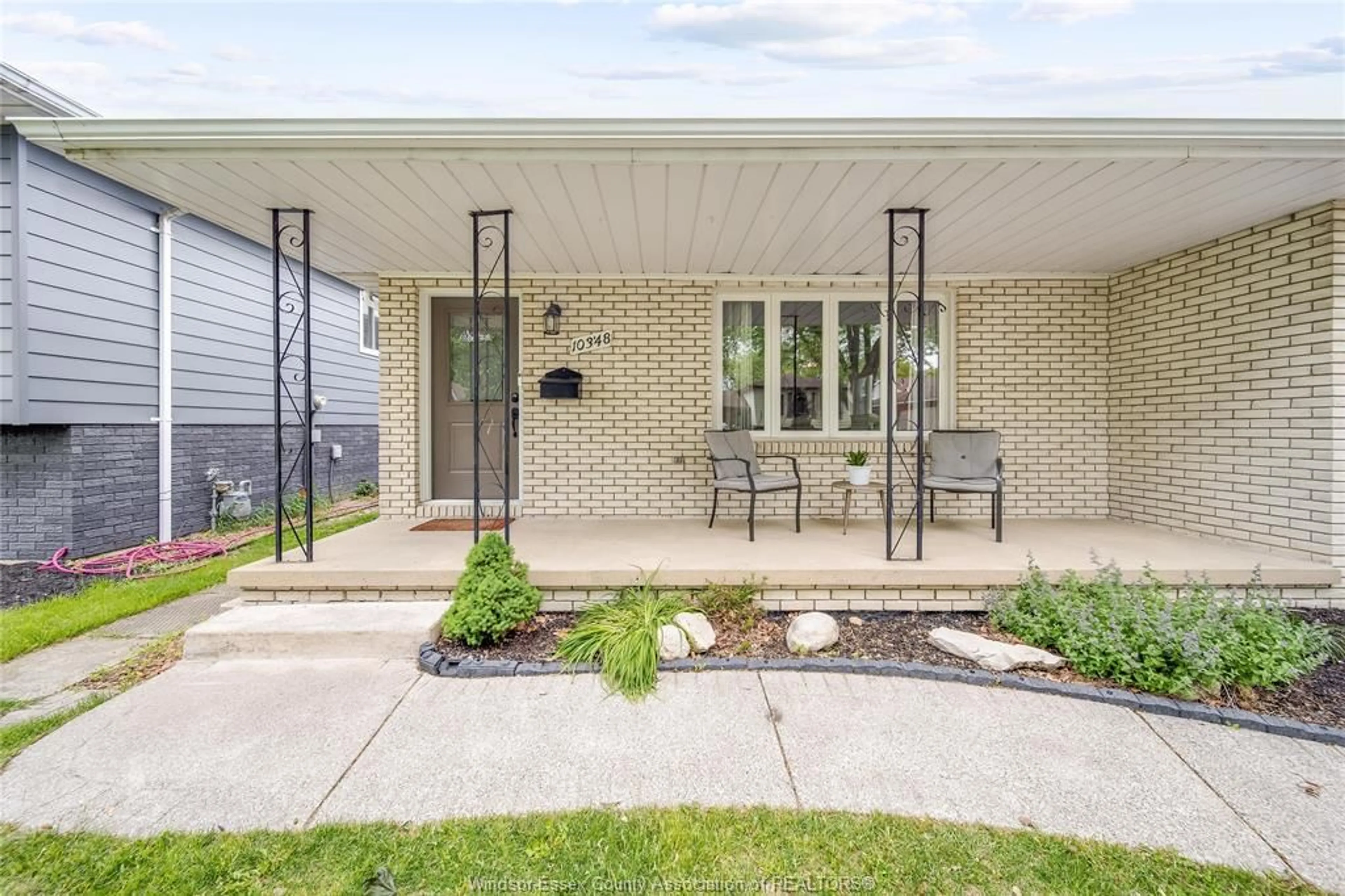 Home with brick exterior material, street for 10348 LONSDALE Cres, Windsor Ontario N8R 2E3