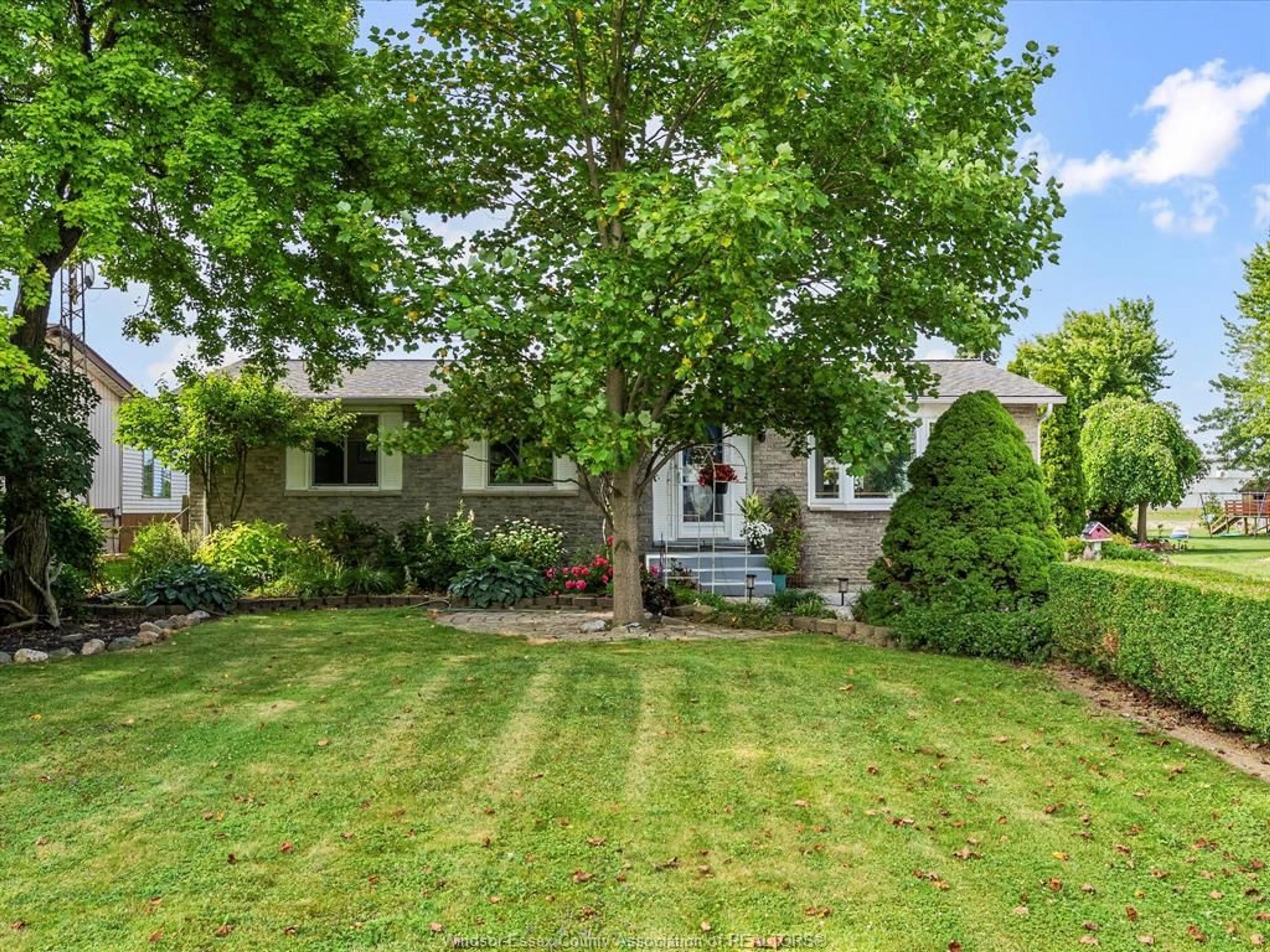A pic from outside/outdoor area/front of a property/back of a property/a pic from drone, street for 640 County Road 8, Leamington Ontario N0P 2J0