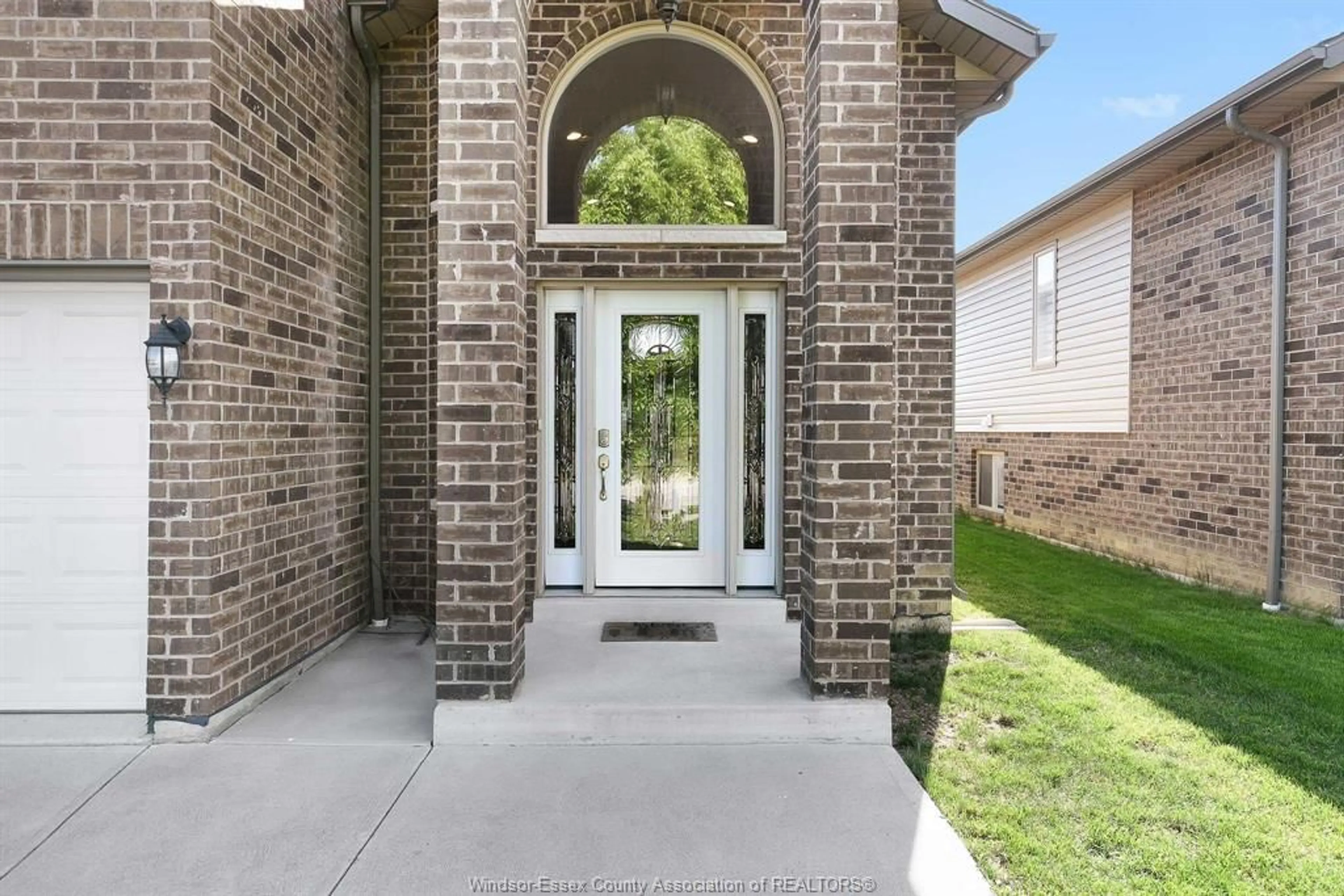 Home with brick exterior material, street for 3028 MCROBBIE Cres, Windsor Ontario N8R 0A7