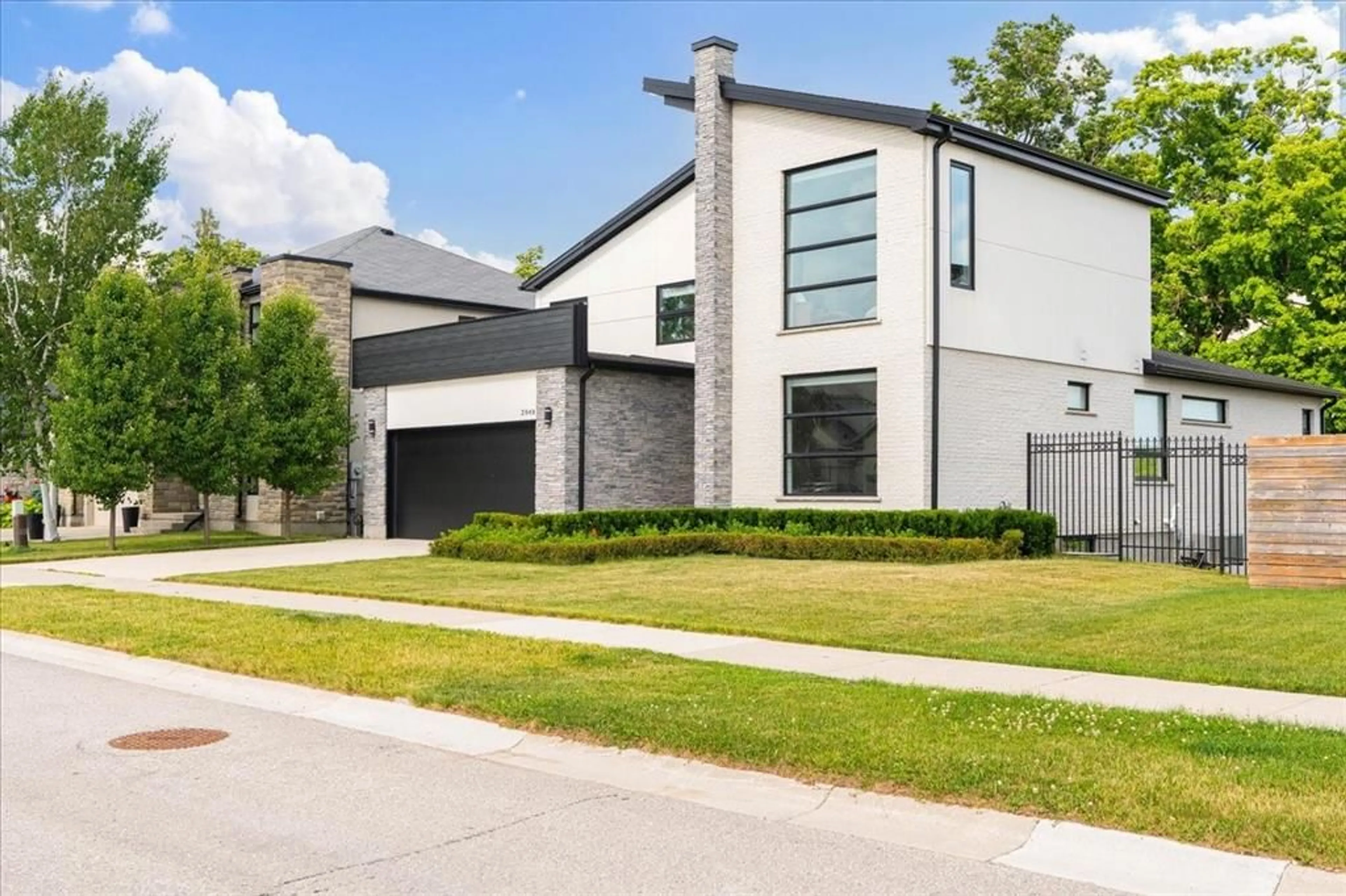 Home with brick exterior material, street for 2048 IRONWOOD Rd, London Ontario N6K 0H8
