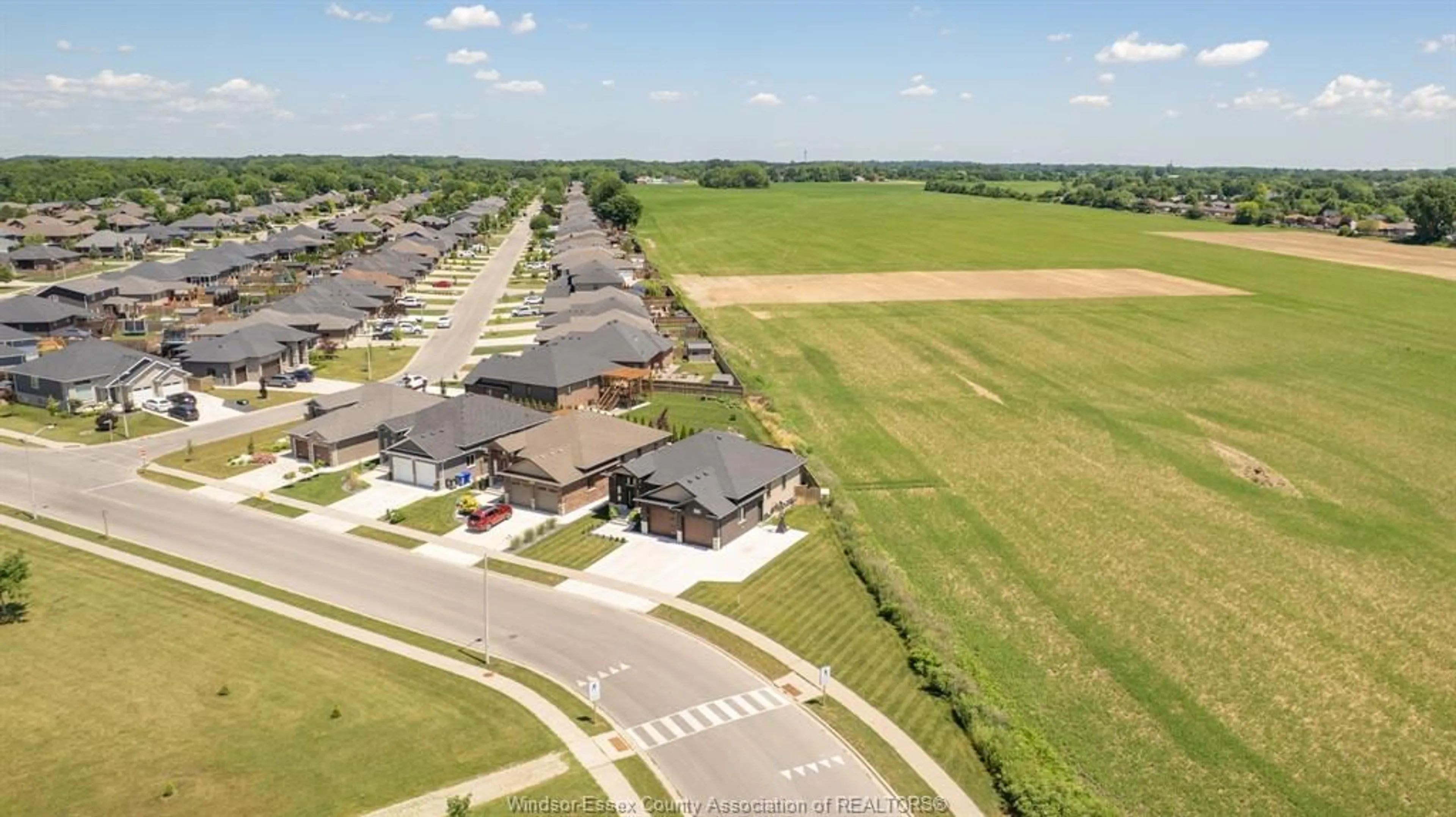 A pic from outside/outdoor area/front of a property/back of a property/a pic from drone, unknown for 105 CONSERVATION Blvd, Kingsville Ontario N9V 0E4