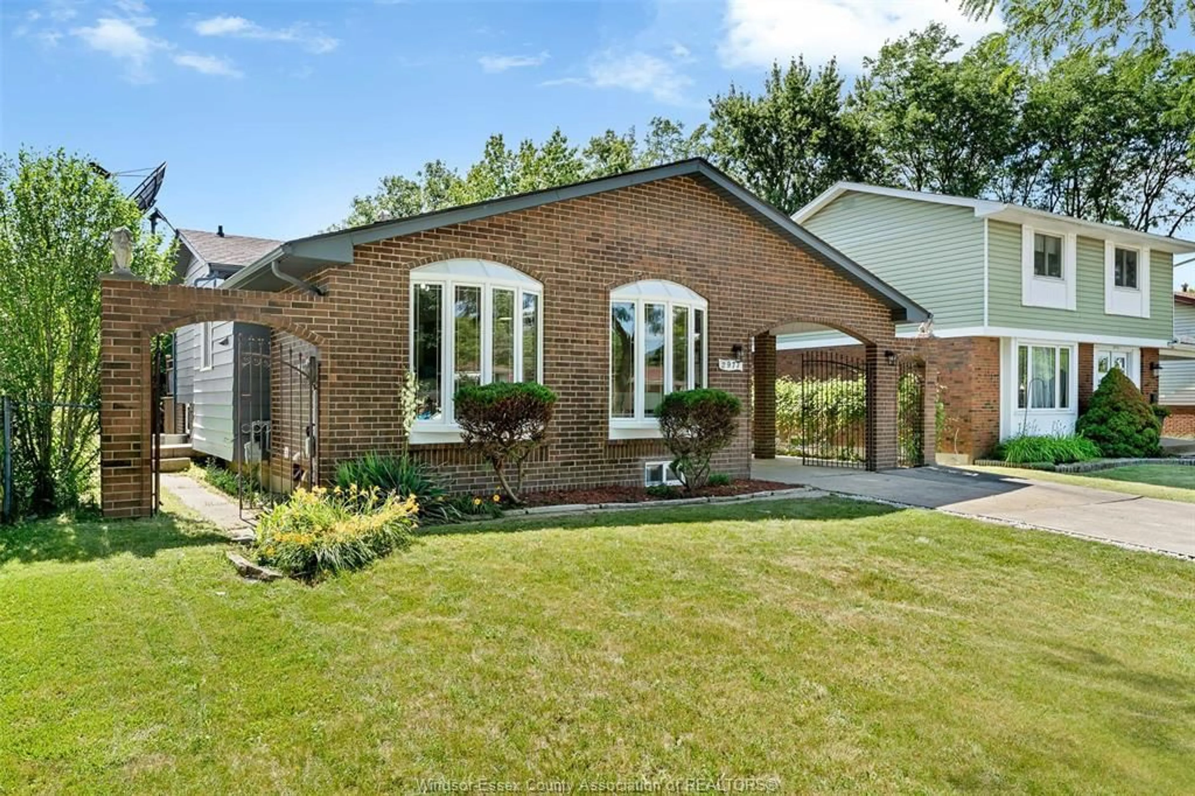 Home with brick exterior material, street for 2977 FOREST GLADE, Windsor Ontario N8R 1L6
