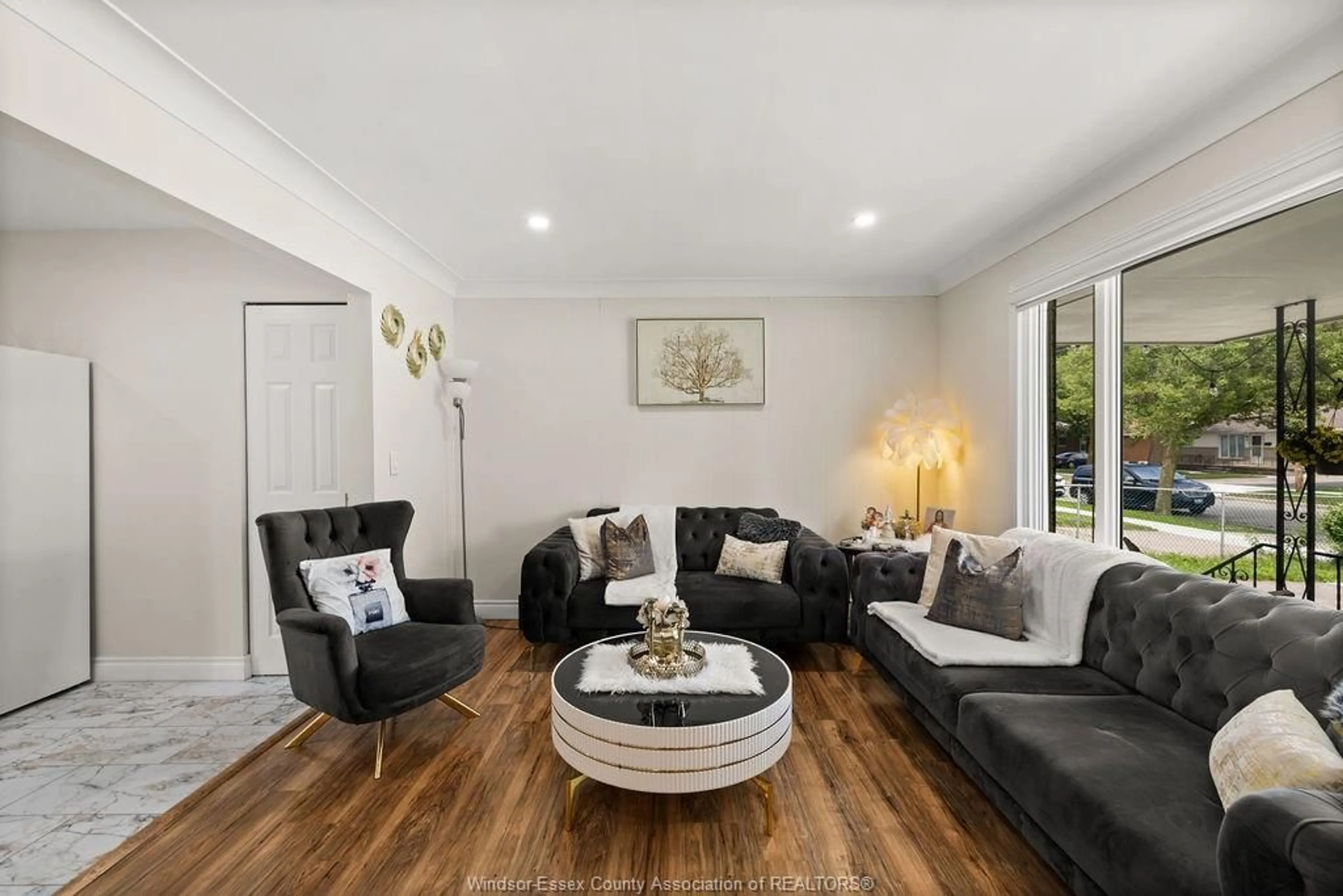 Living room with furniture, wood/laminate floor for 1697 FERNDALE Ave, Windsor Ontario N8T 2K6