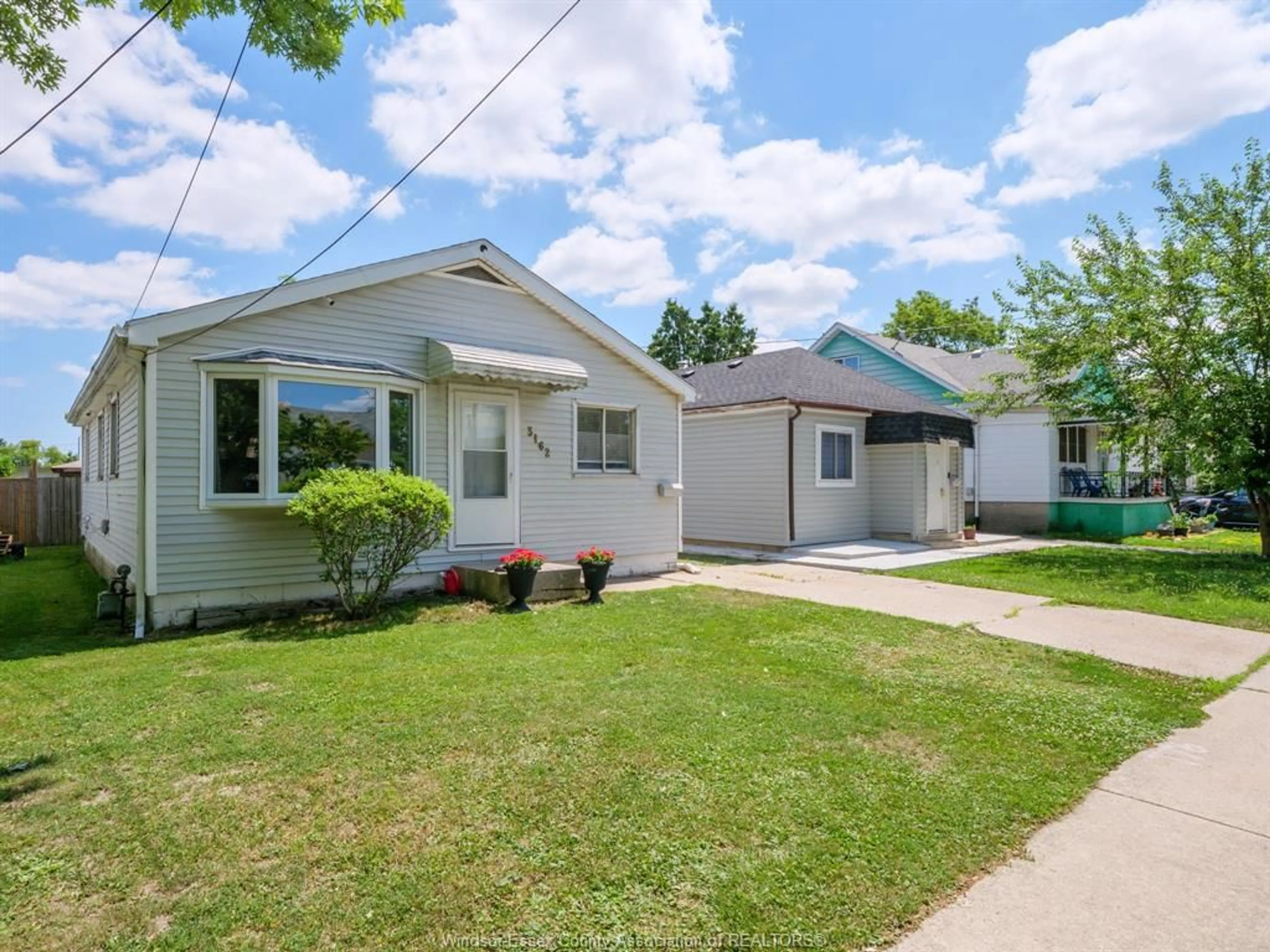 Home with vinyl exterior material, street for 3162 Riberdy Rd, Windsor Ontario N8W 3T8