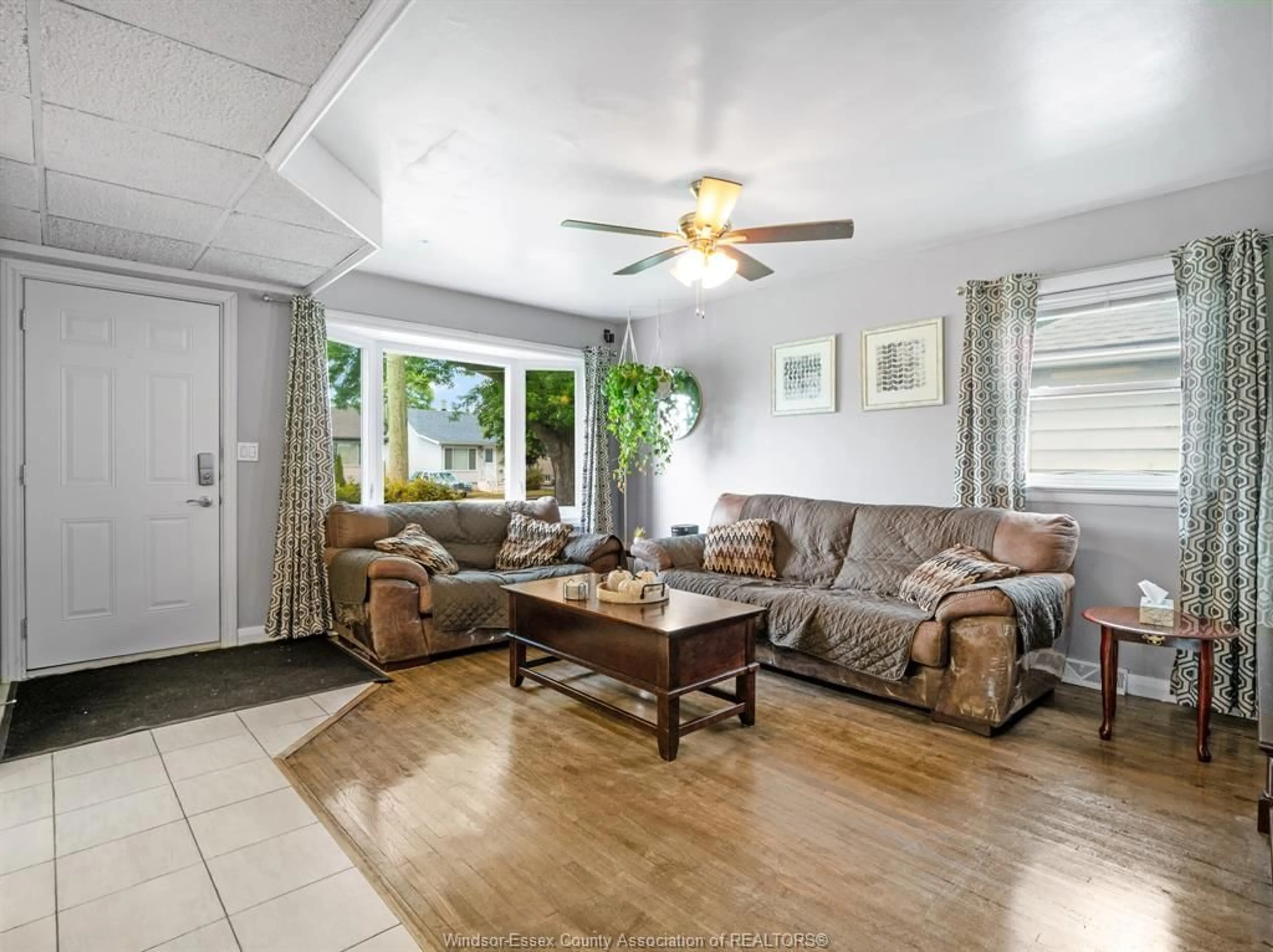 Living room with furniture, unknown for 3162 Riberdy Rd, Windsor Ontario N8W 3T8