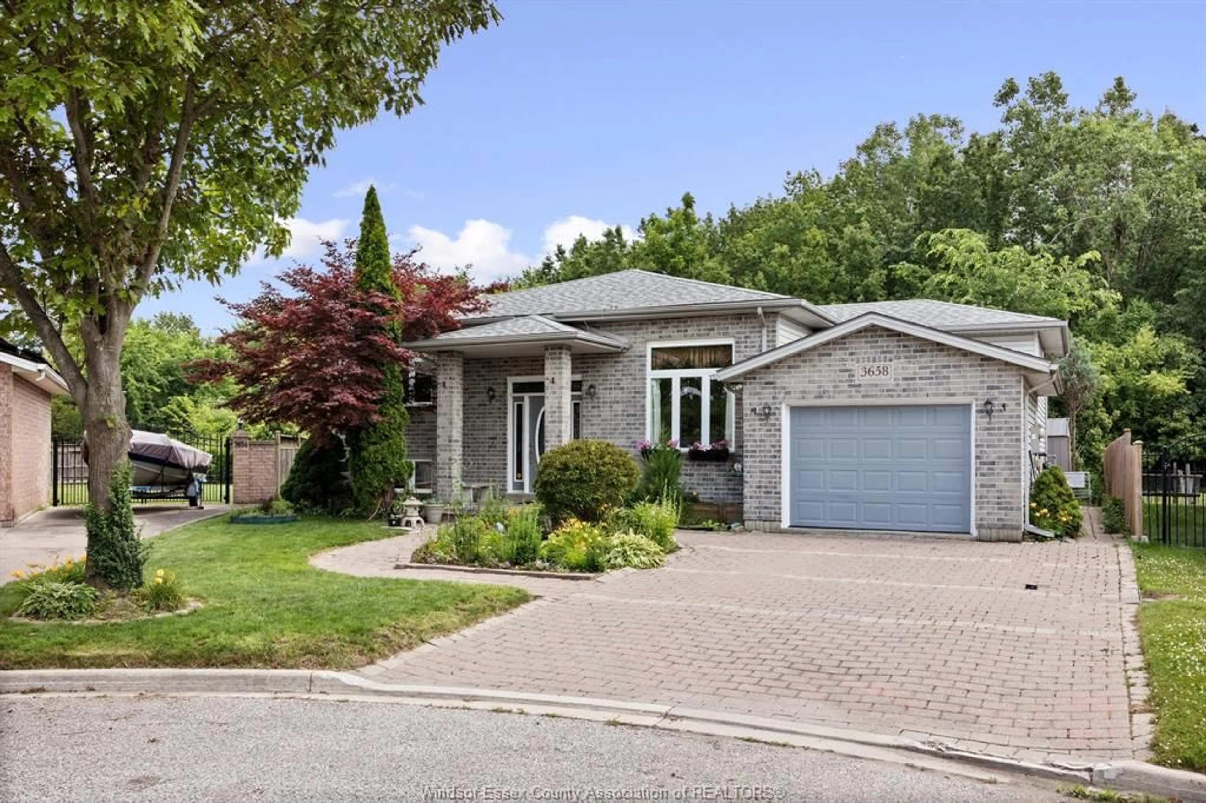 Home with brick exterior material, street for 3658 IRONGATE Cir, Windsor Ontario N8W 5T4
