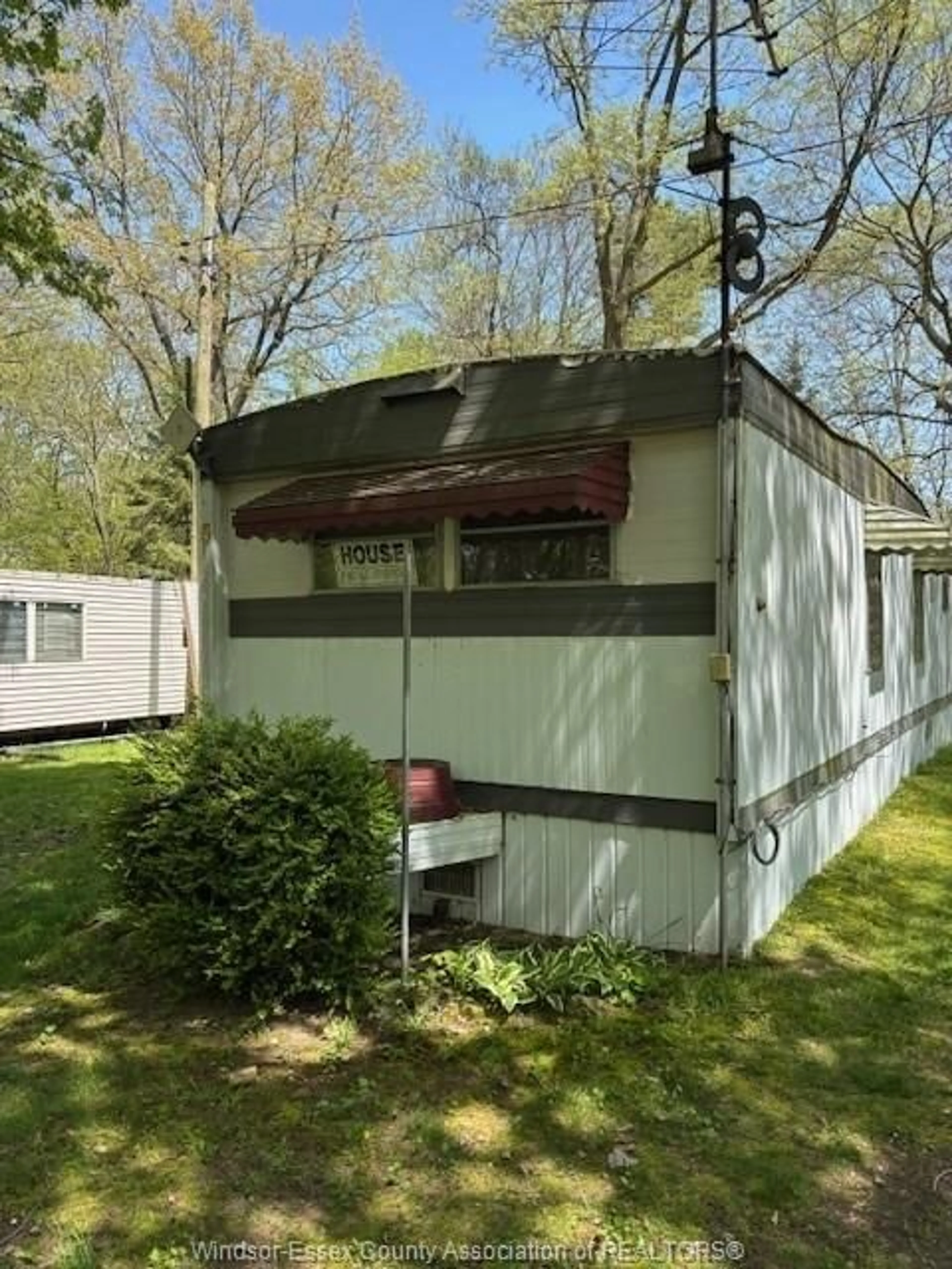 Home with vinyl exterior material, street for 445 COUNTY ROAD 50 #5, Harrow Ontario N0R 1G0