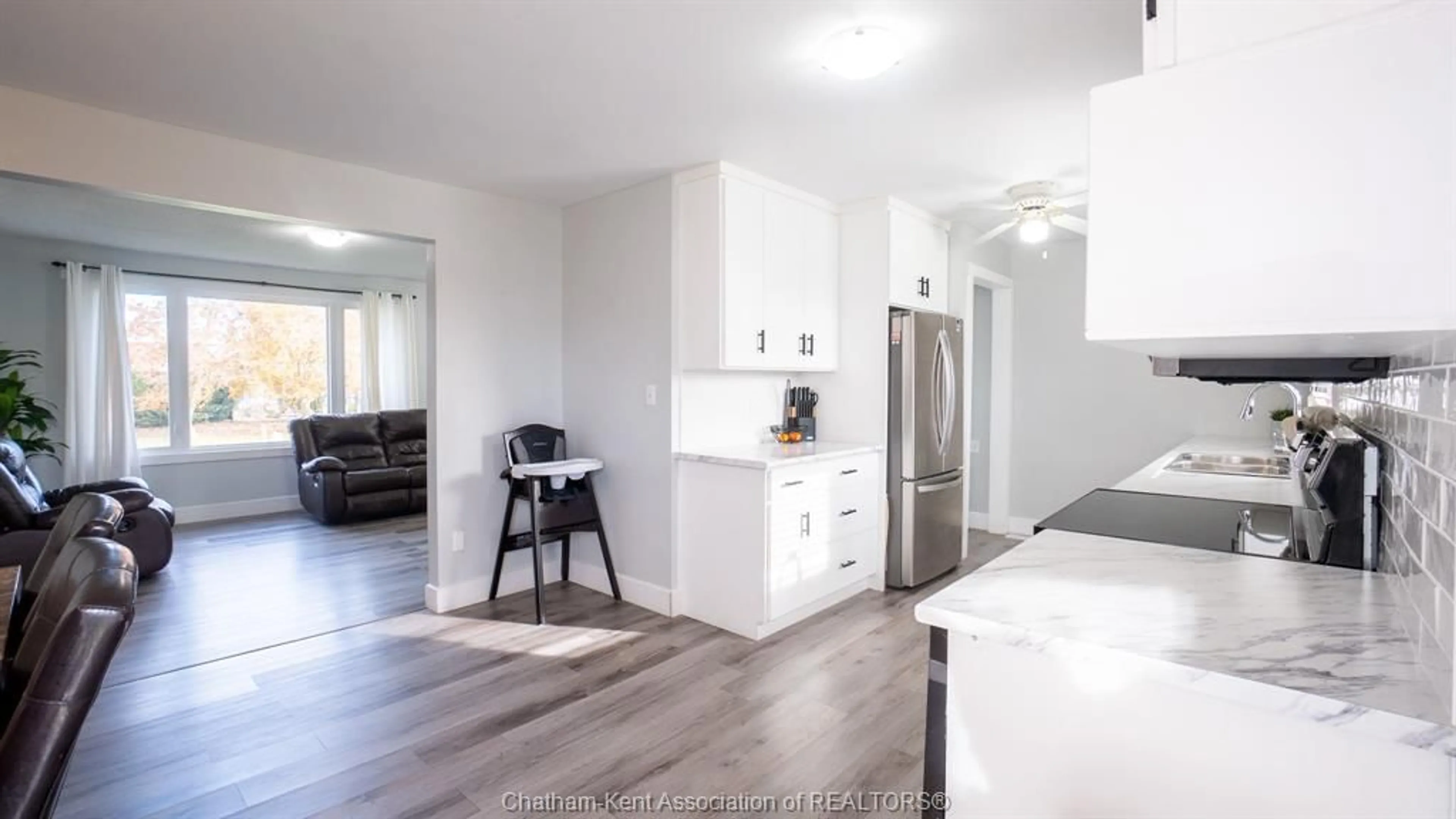 Open concept kitchen, wood/laminate floor for 4539 SHAMROCK St, Oil City Ontario N0N 1N0