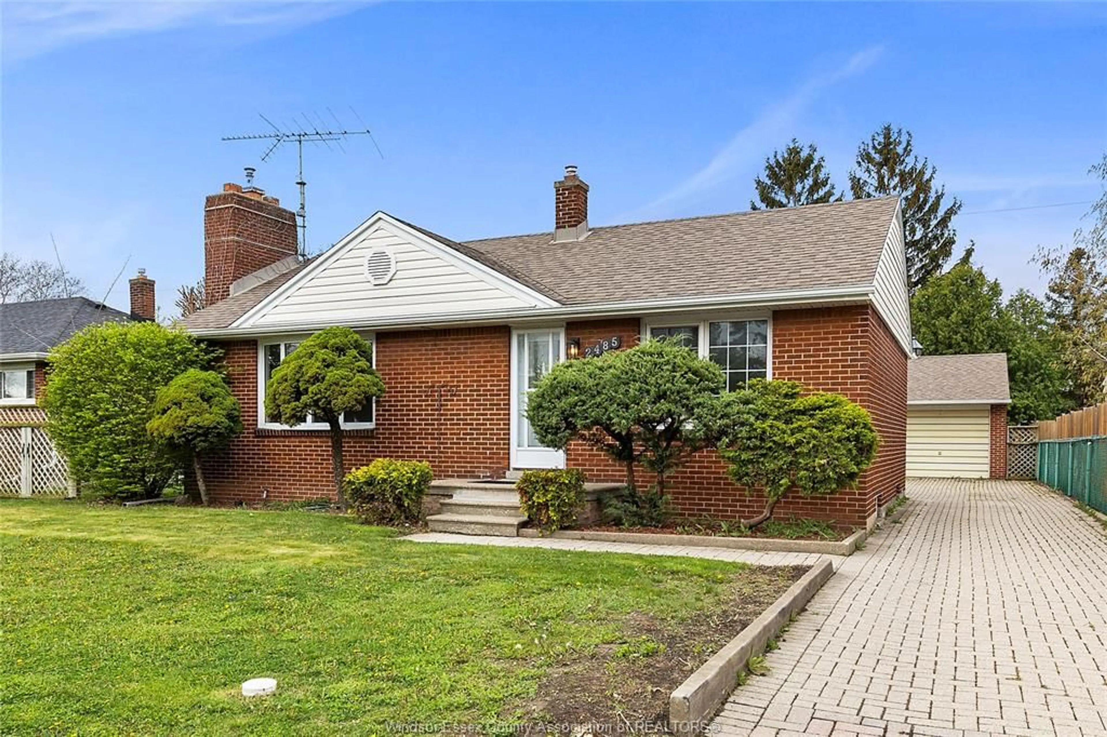 Home with brick exterior material, street for 2485 DOMINION Blvd, Windsor Ontario N9E 2M5