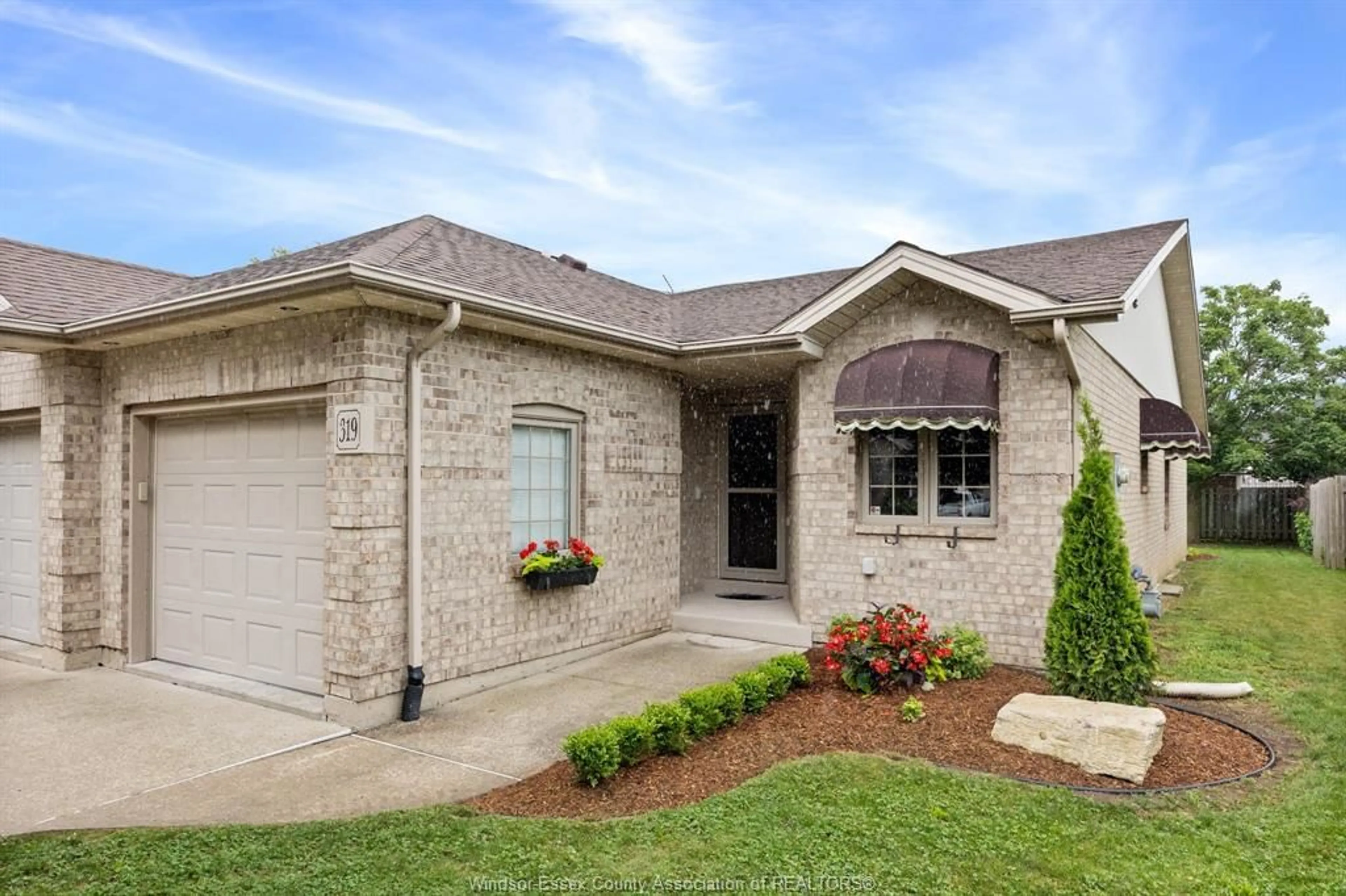 Home with brick exterior material, street for 319 ROCKPORT Lane, Kingsville Ontario N9Y 4A4