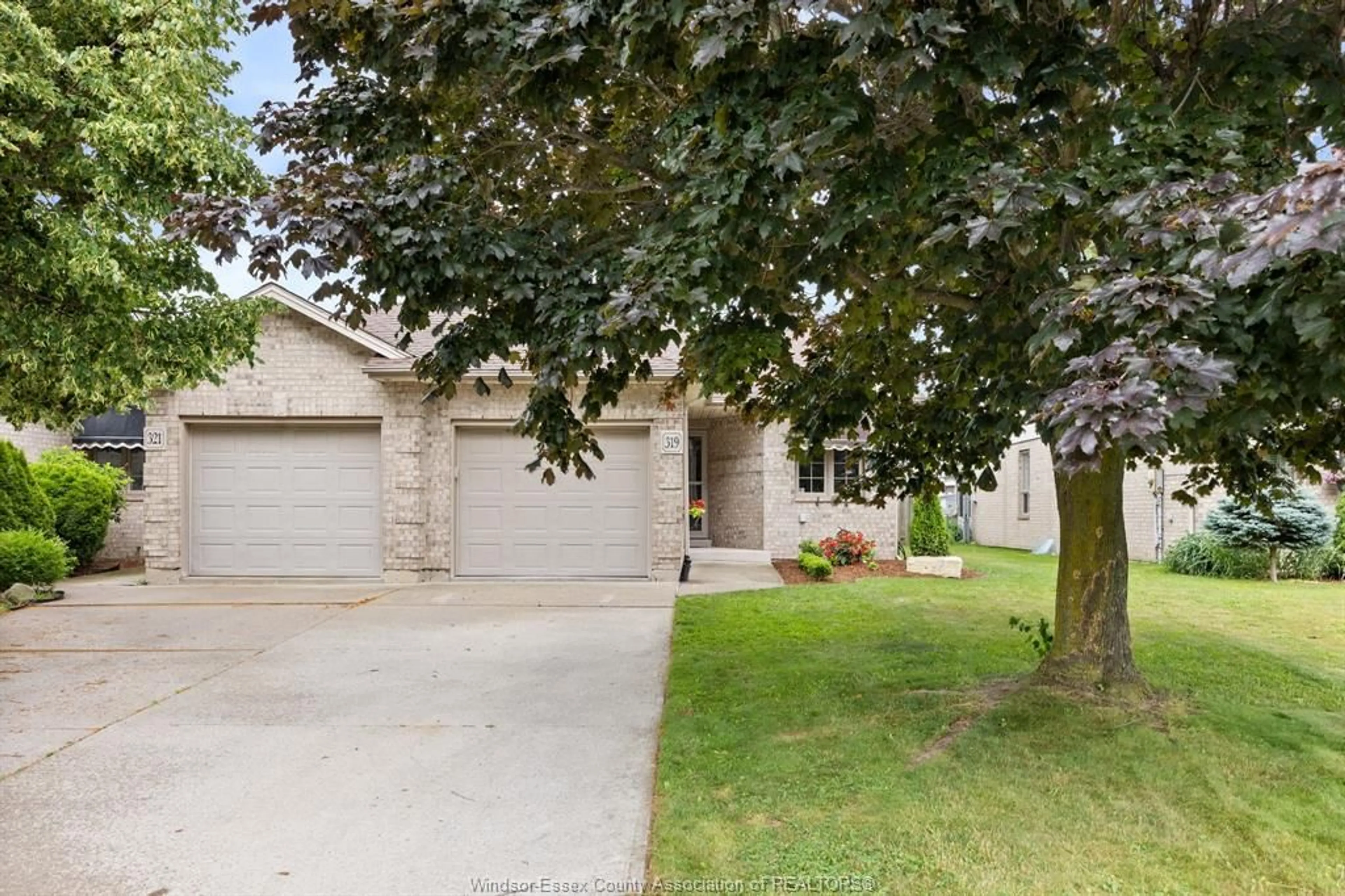 A pic from outside/outdoor area/front of a property/back of a property/a pic from drone, street for 319 ROCKPORT Lane, Kingsville Ontario N9Y 4A4