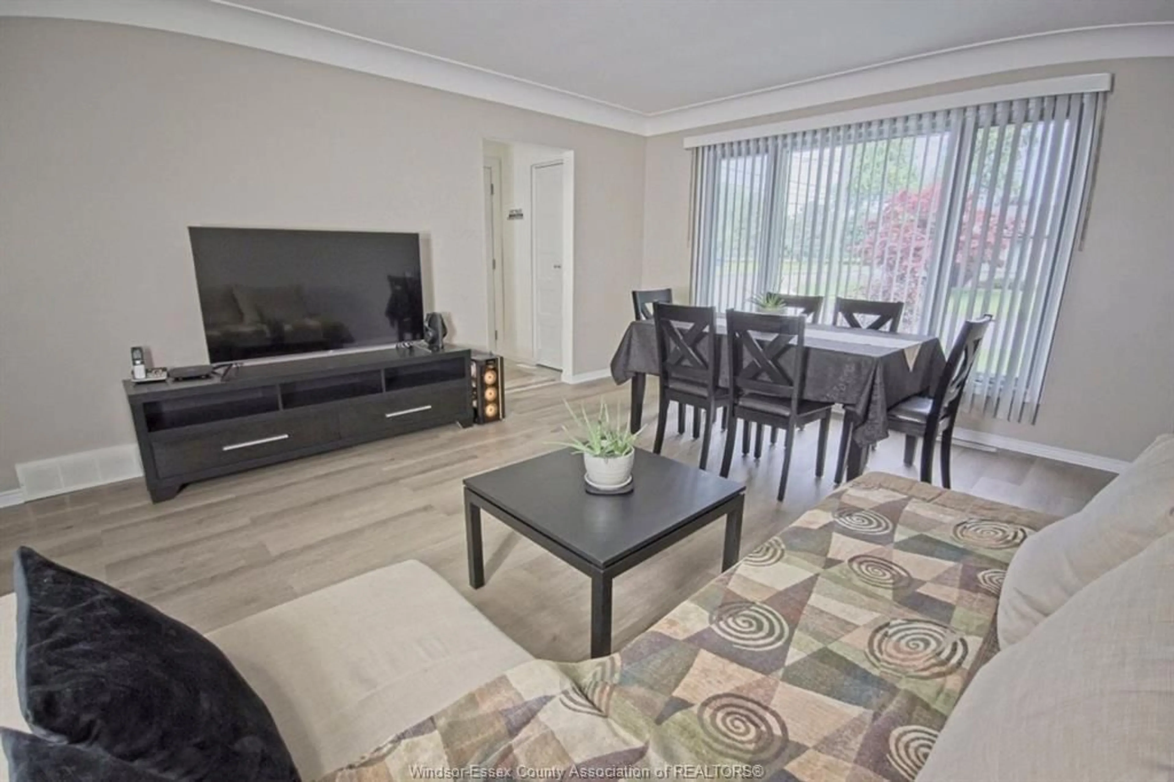 Living room with furniture, wood/laminate floor for 1290 MATTHEW BRADY Blvd, Windsor Ontario N8S 3K4