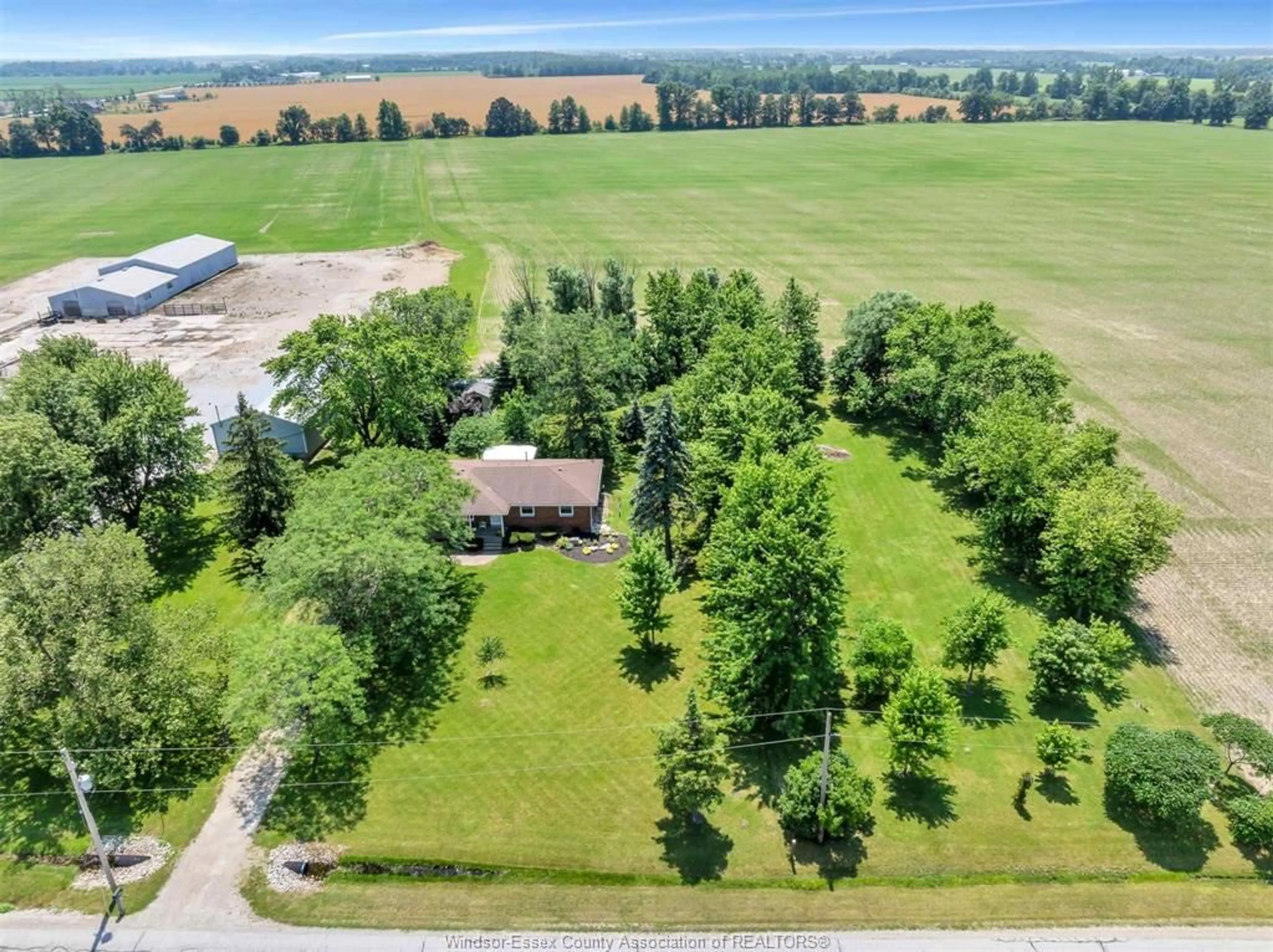 A pic from outside/outdoor area/front of a property/back of a property/a pic from drone, unknown for 3927 South Talbot Rd, Tecumseh Ontario N0R 1L0