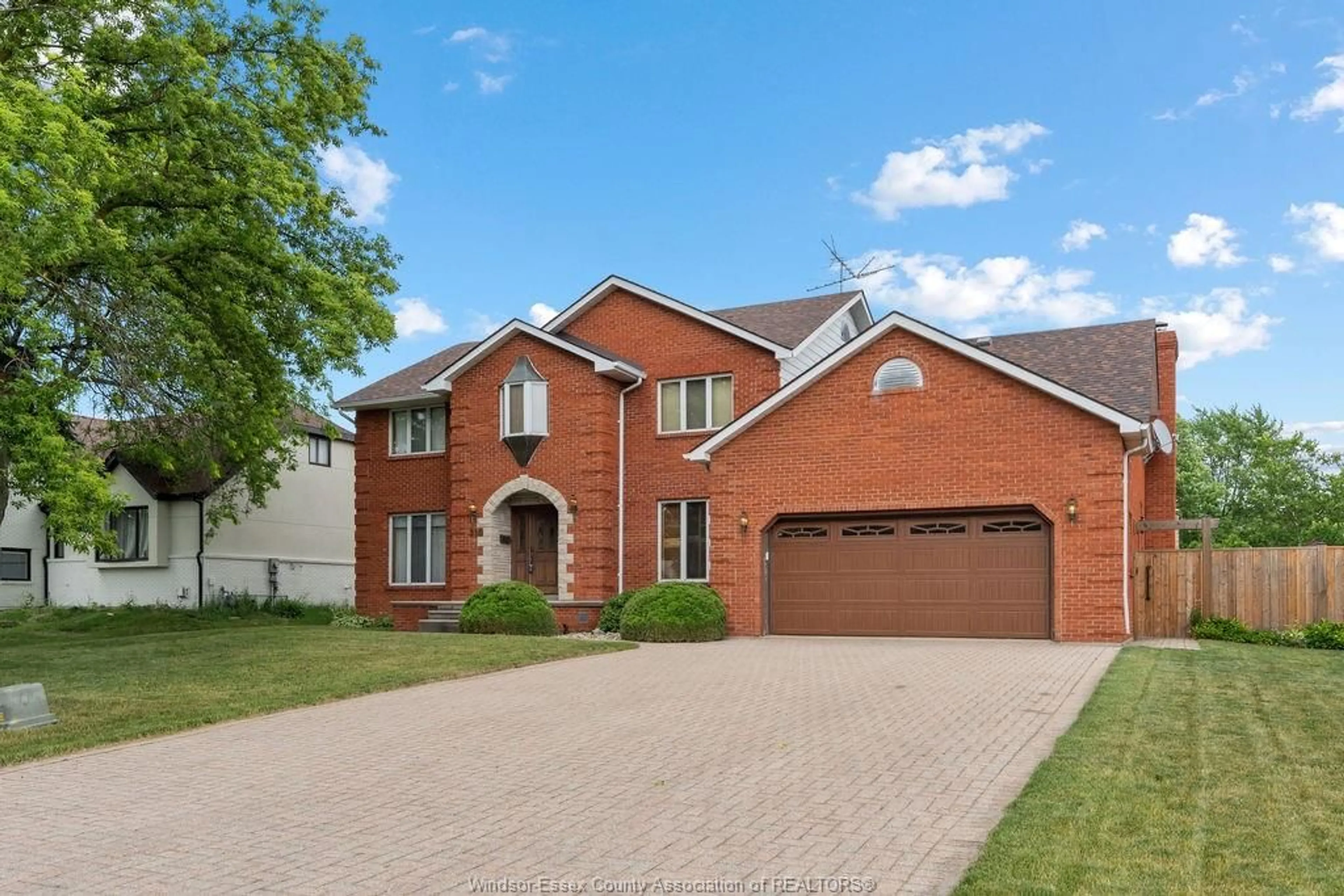 Home with brick exterior material, street for 510 HARBOURNE Cres, Tecumseh Ontario N8N 3J2