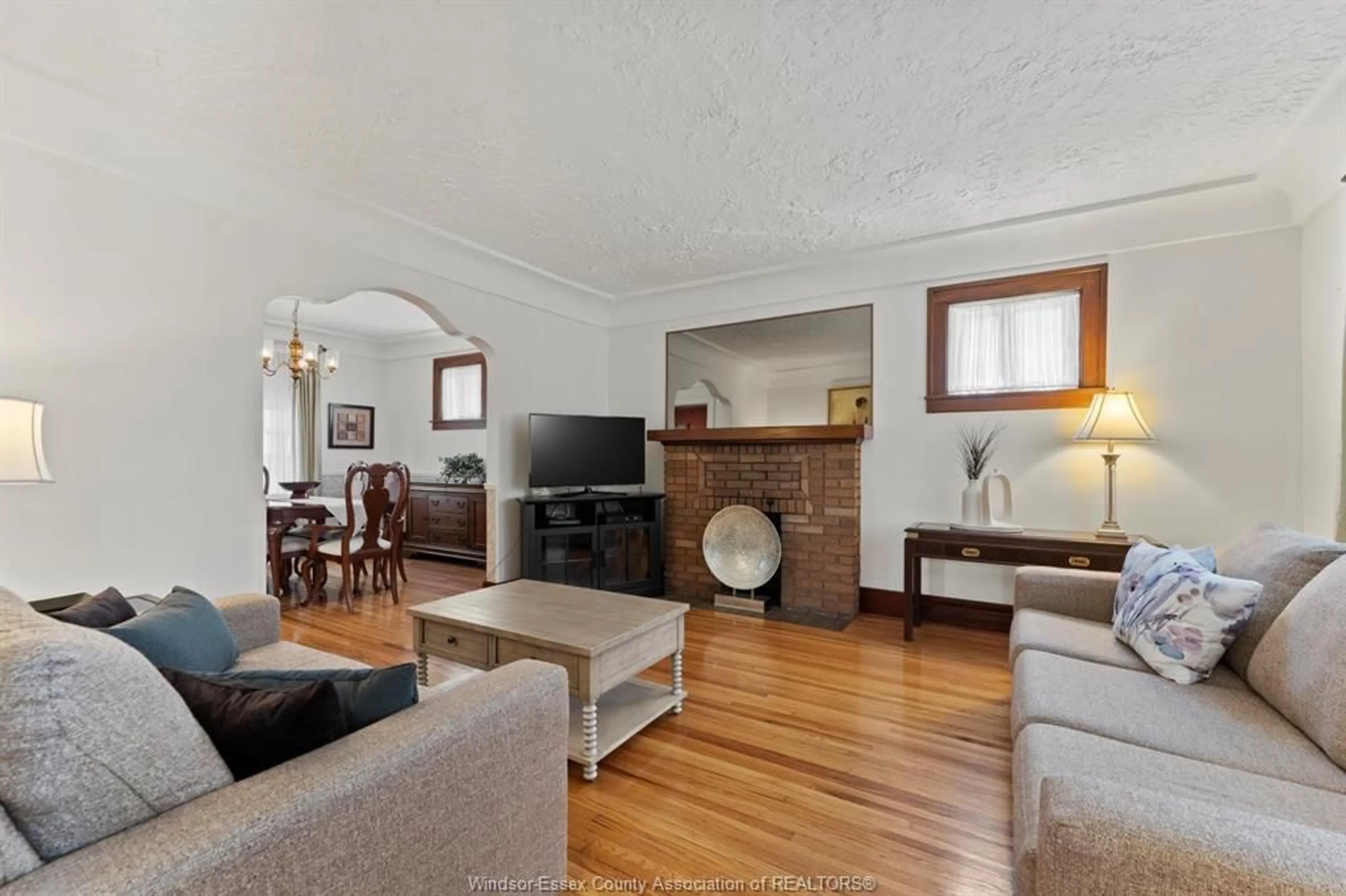 Living room with furniture, wood/laminate floor for 2208 MOY AVE., Windsor Ontario N8W 2M6