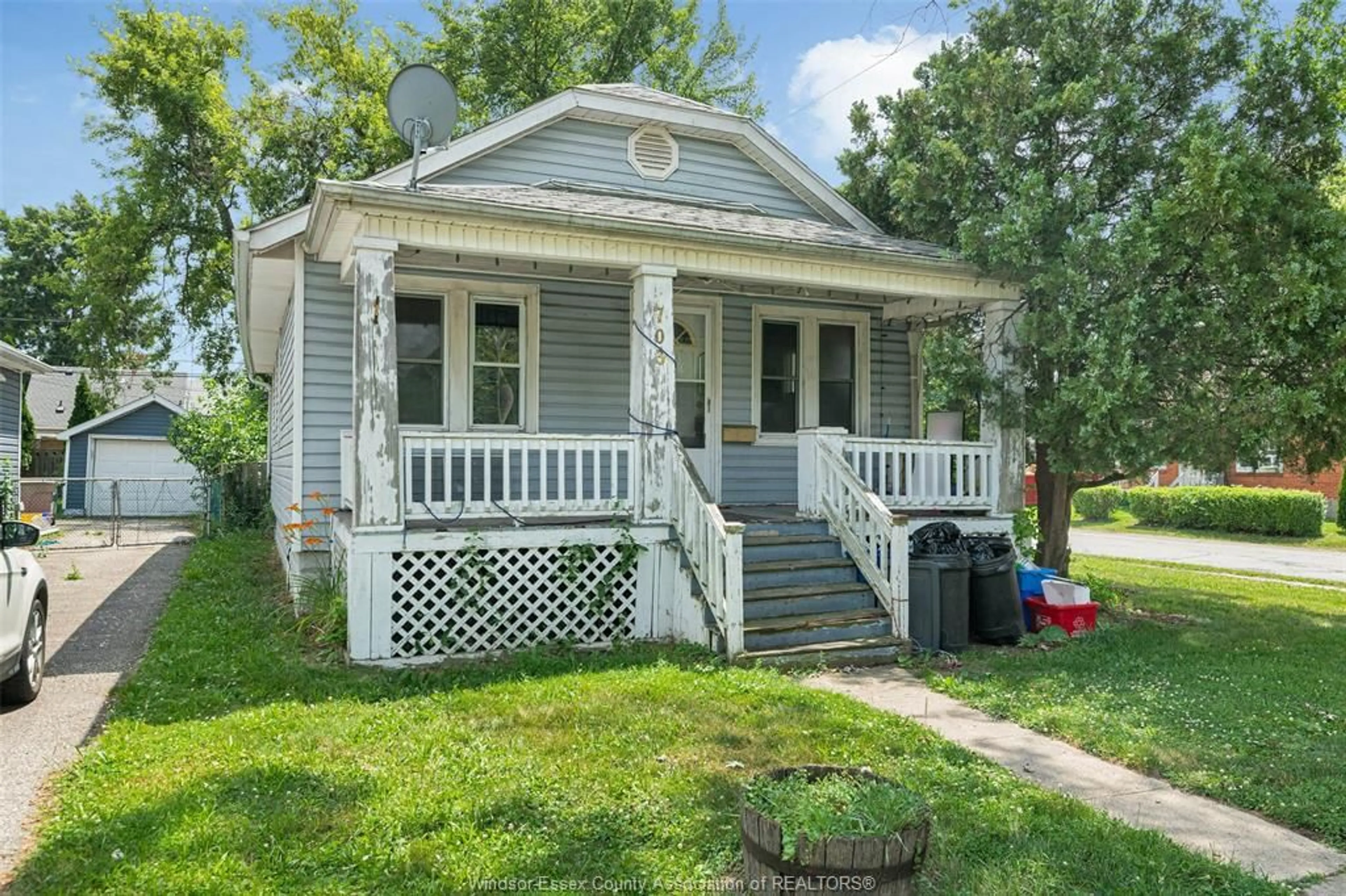 Home with vinyl exterior material, street for 703 CHARLOTTE STREET, Windsor Ontario N8X 3A7