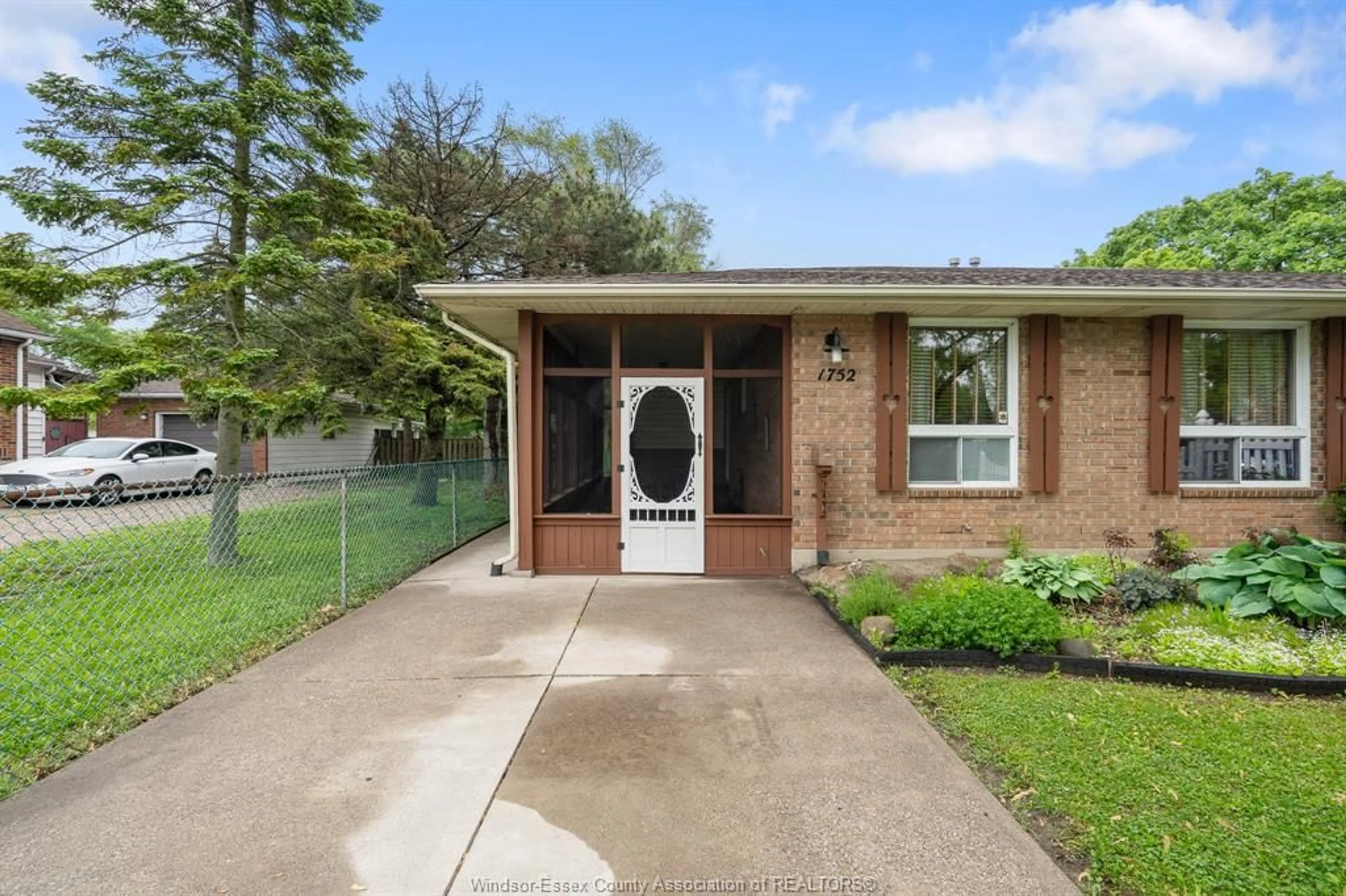 Home with brick exterior material, street for 1752 NORMAN Rd, Windsor Ontario N8Y 4N8