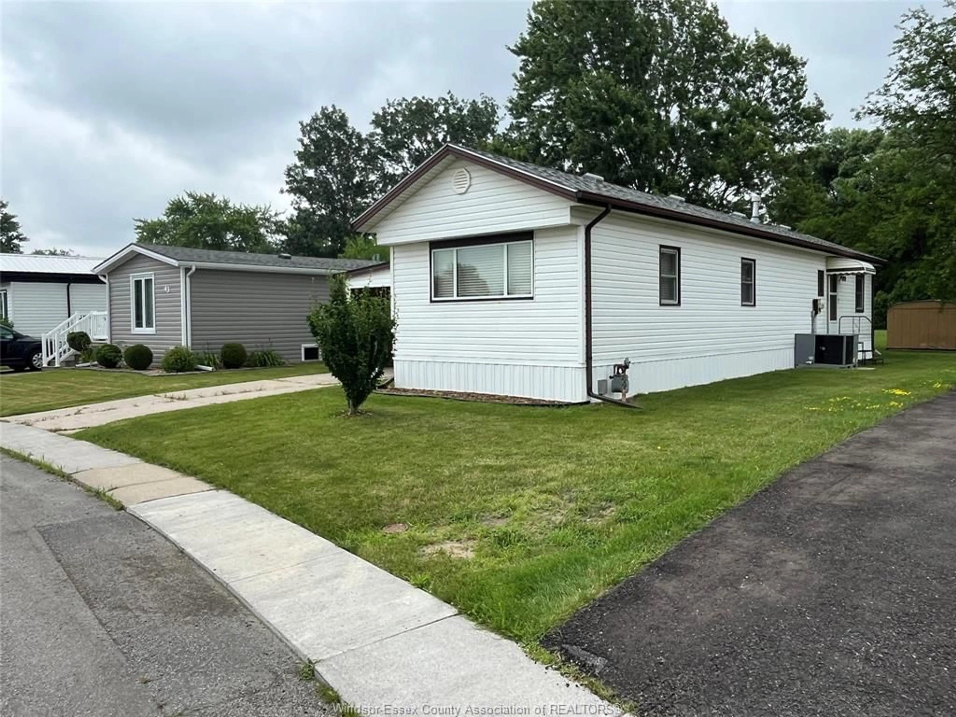 Home with vinyl exterior material, street for 44 MIRIAM Crt, Essex Ontario N8M 1Z2