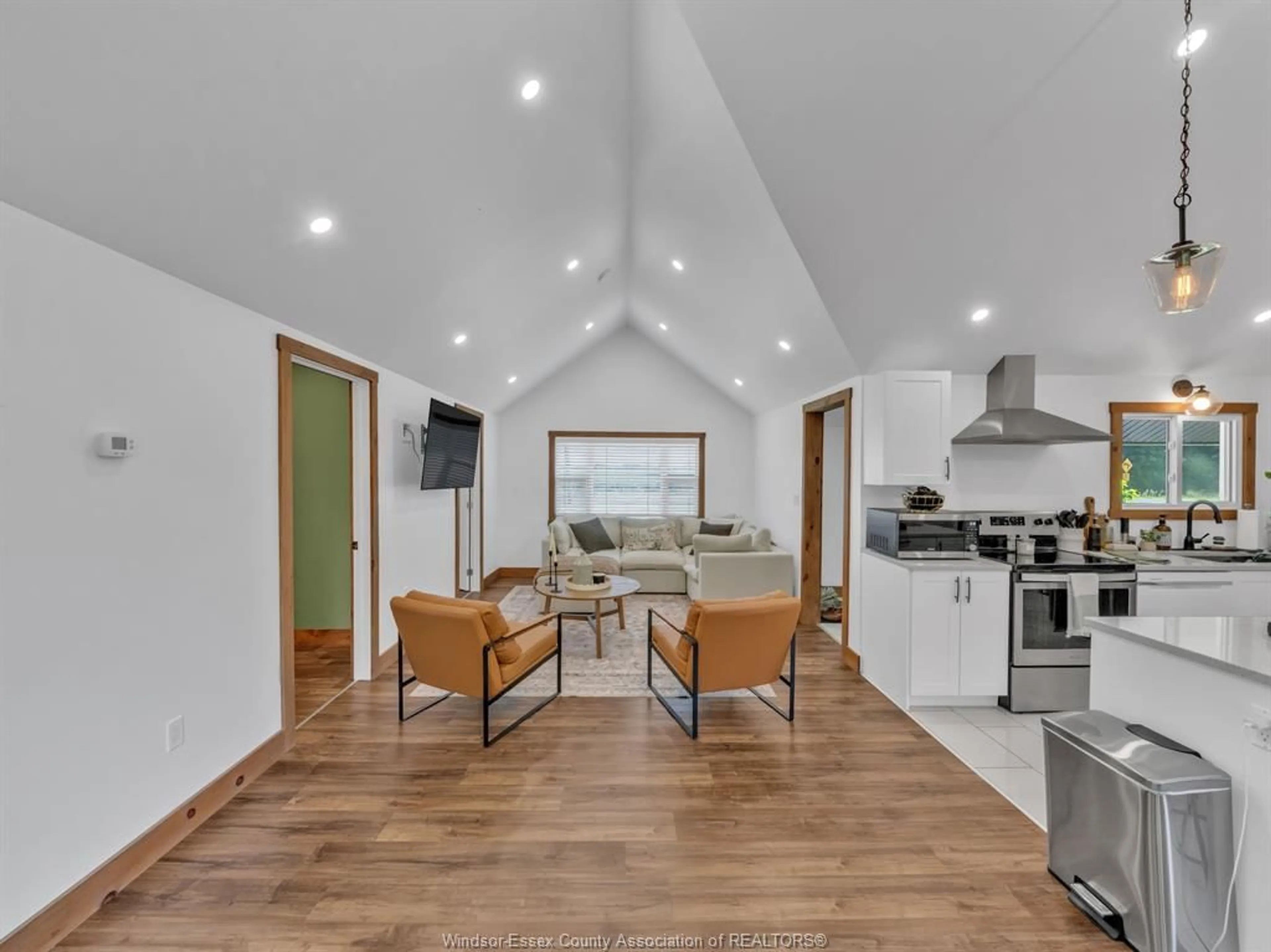 Open concept kitchen, wood/laminate floor for 2416 Fox Run Rd, Leamington Ontario N8H 3V7