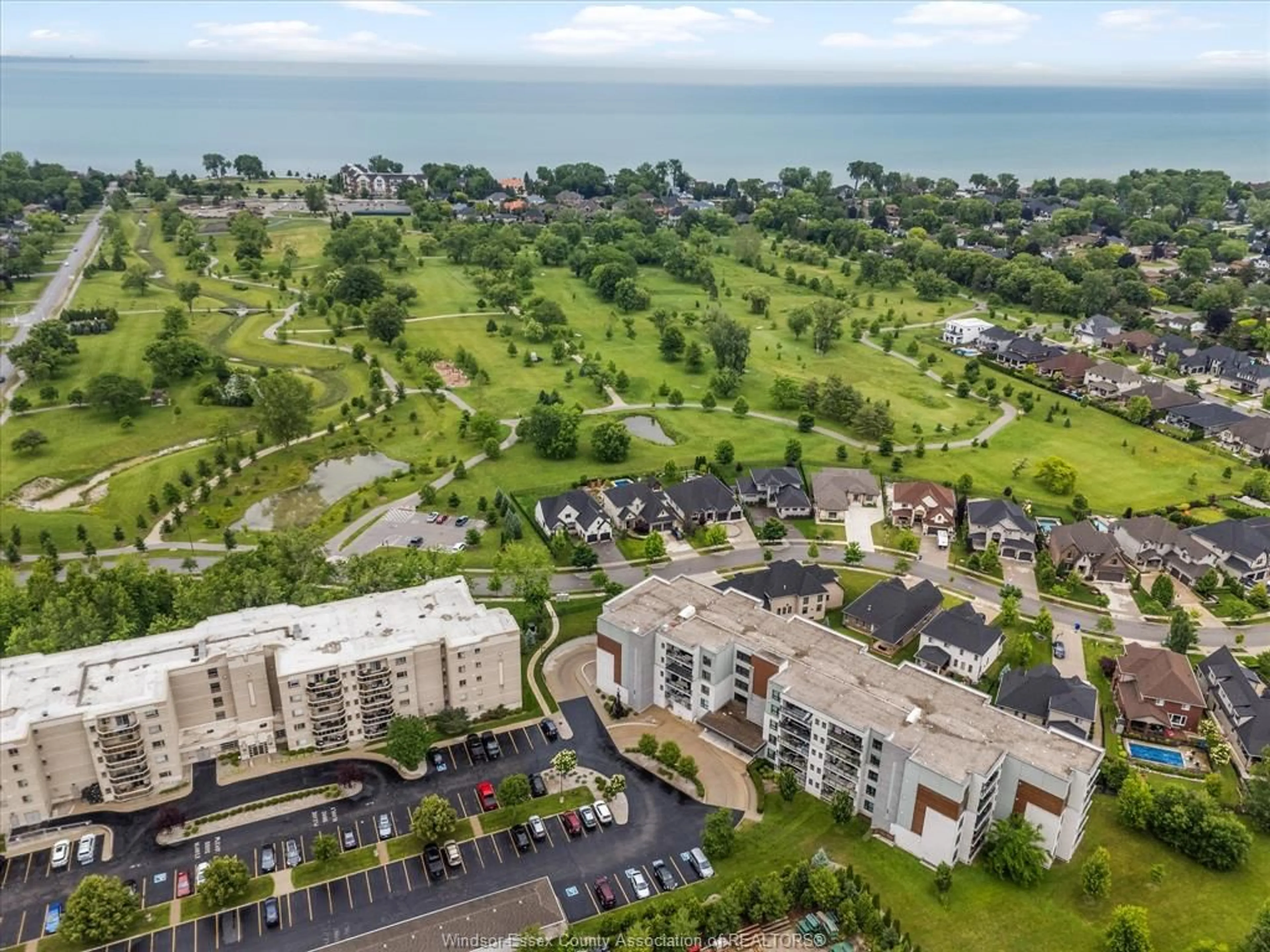 A pic from outside/outdoor area/front of a property/back of a property/a pic from drone, water/lake/river/ocean view for 250 Manning #204, Tecumseh Ontario N8H 0A8