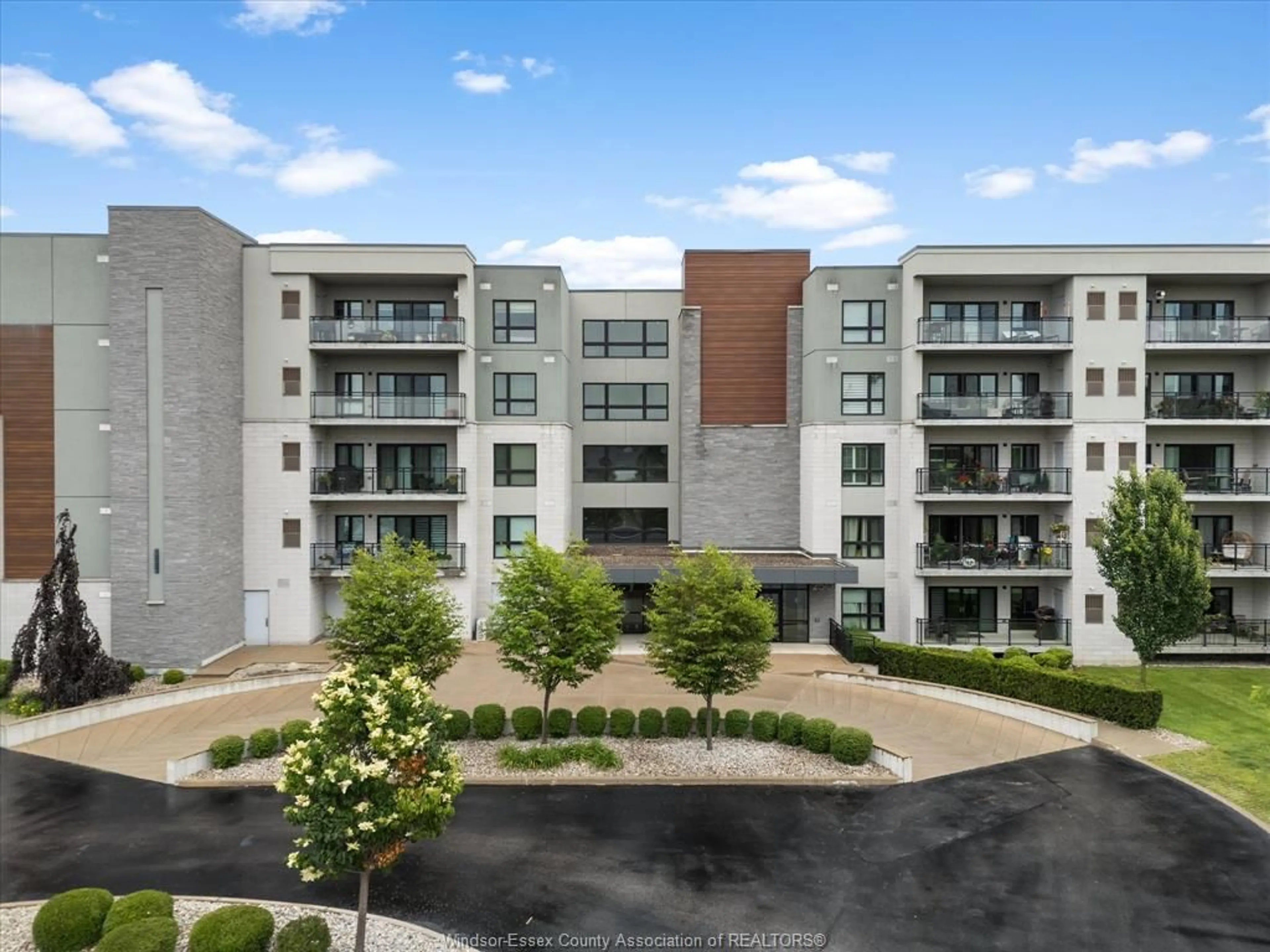 A pic from outside/outdoor area/front of a property/back of a property/a pic from drone, unknown for 250 Manning #204, Tecumseh Ontario N8H 0A8