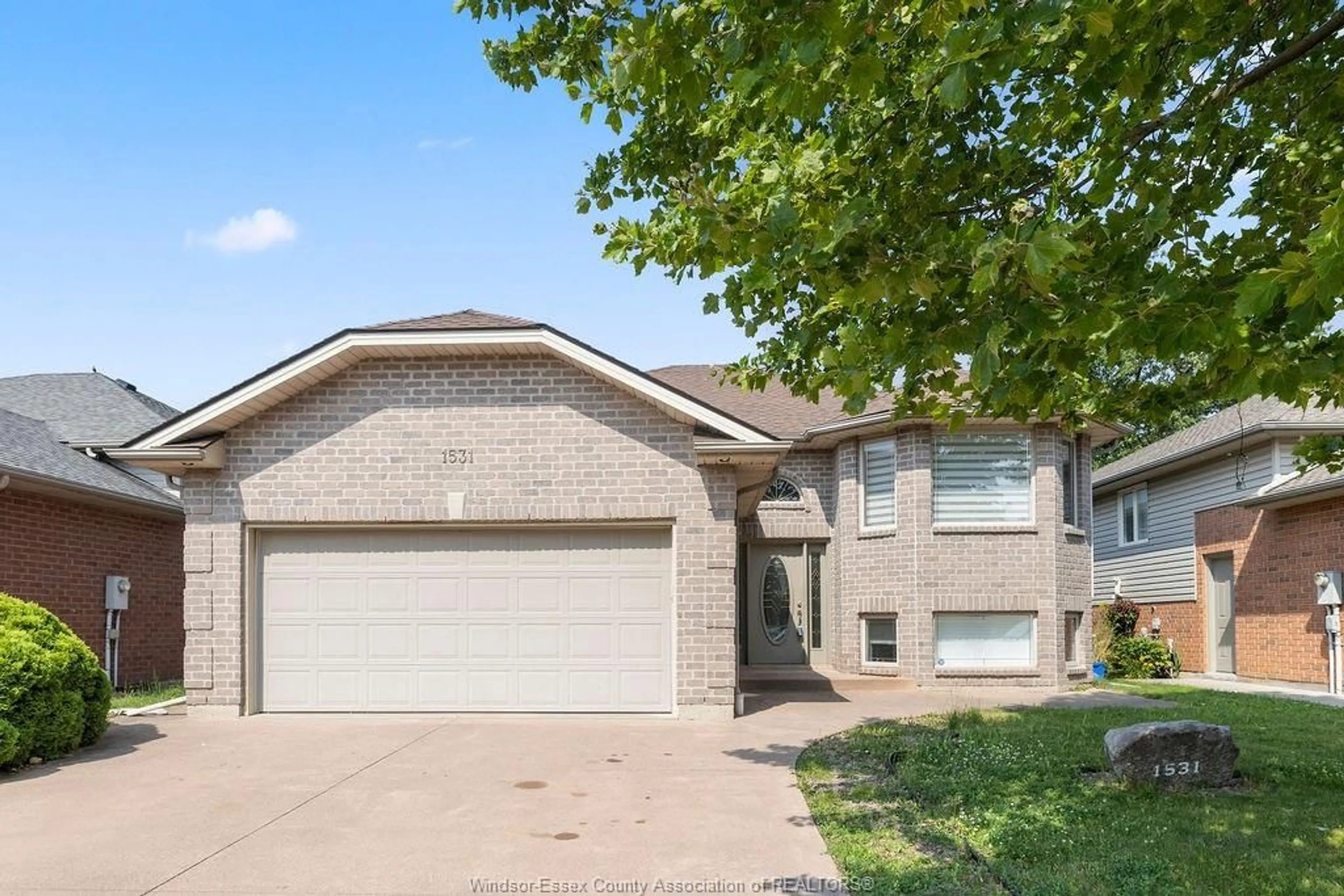 Home with brick exterior material, street for 1531 CLOVER Ave, Windsor Ontario N8P 1R2