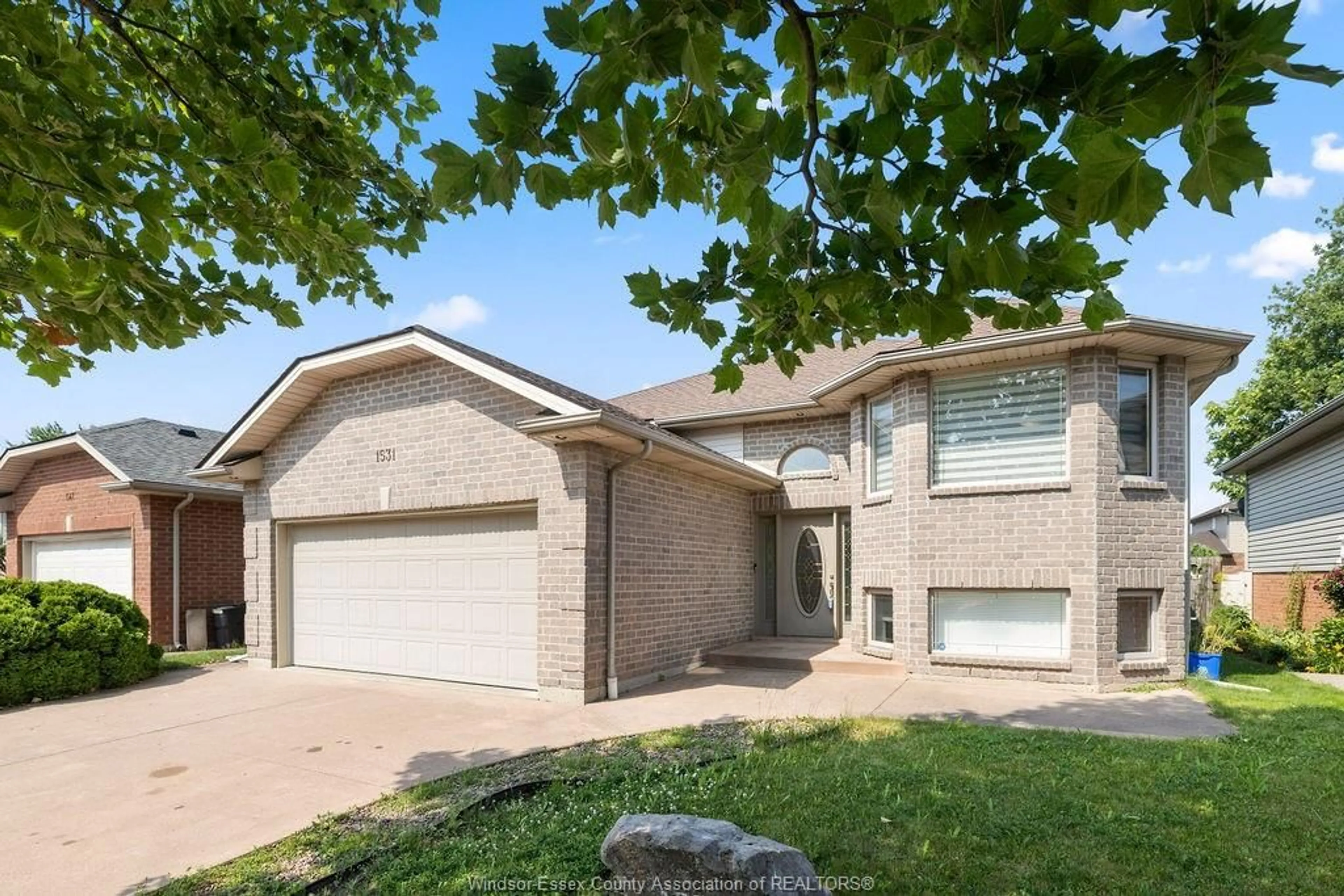Home with brick exterior material, street for 1531 CLOVER Ave, Windsor Ontario N8P 1R2
