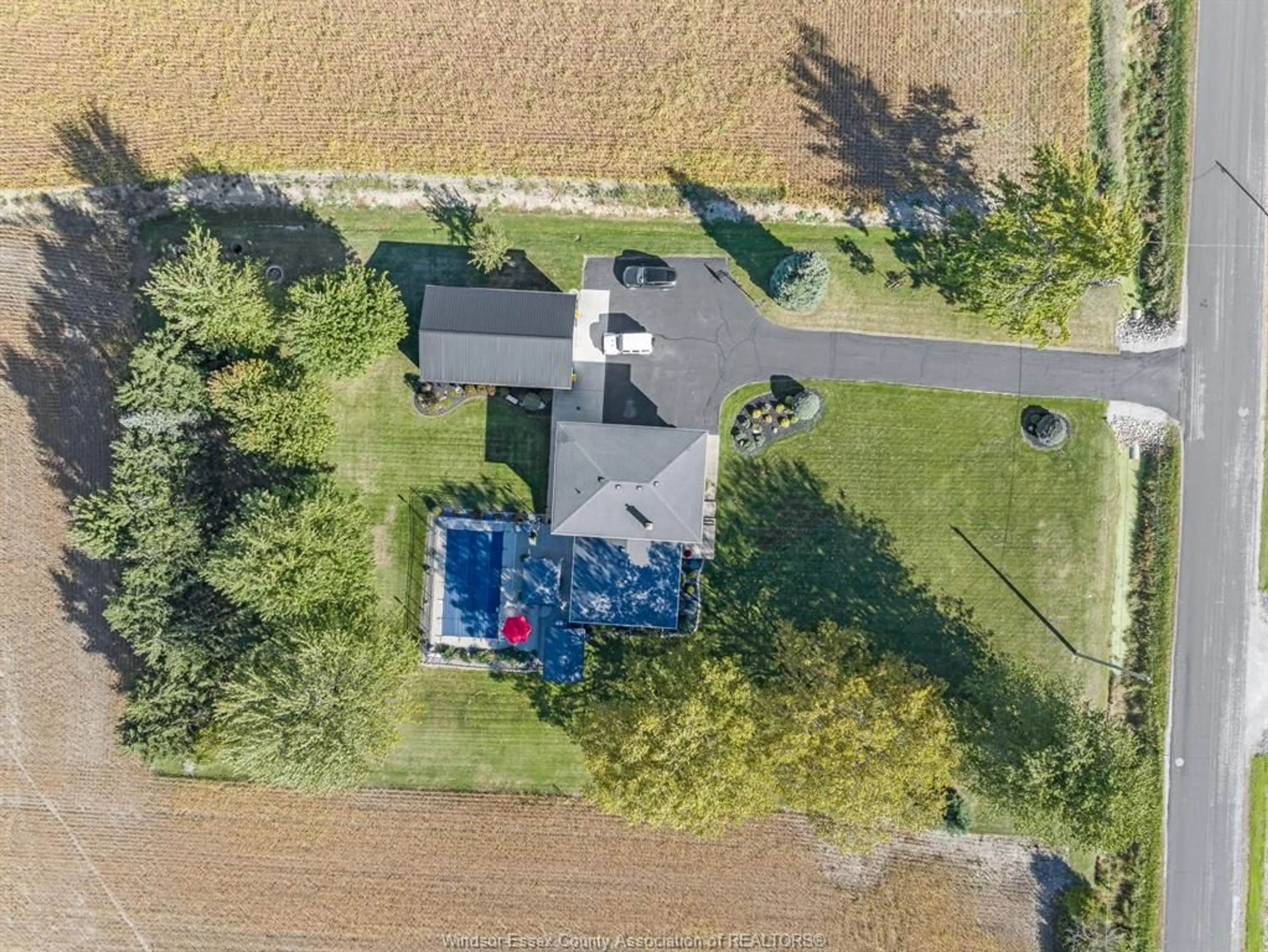 A pic from outside/outdoor area/front of a property/back of a property/a pic from drone, street for 1539 MERSEA RD 2, Leamington Ontario N8H 3V7