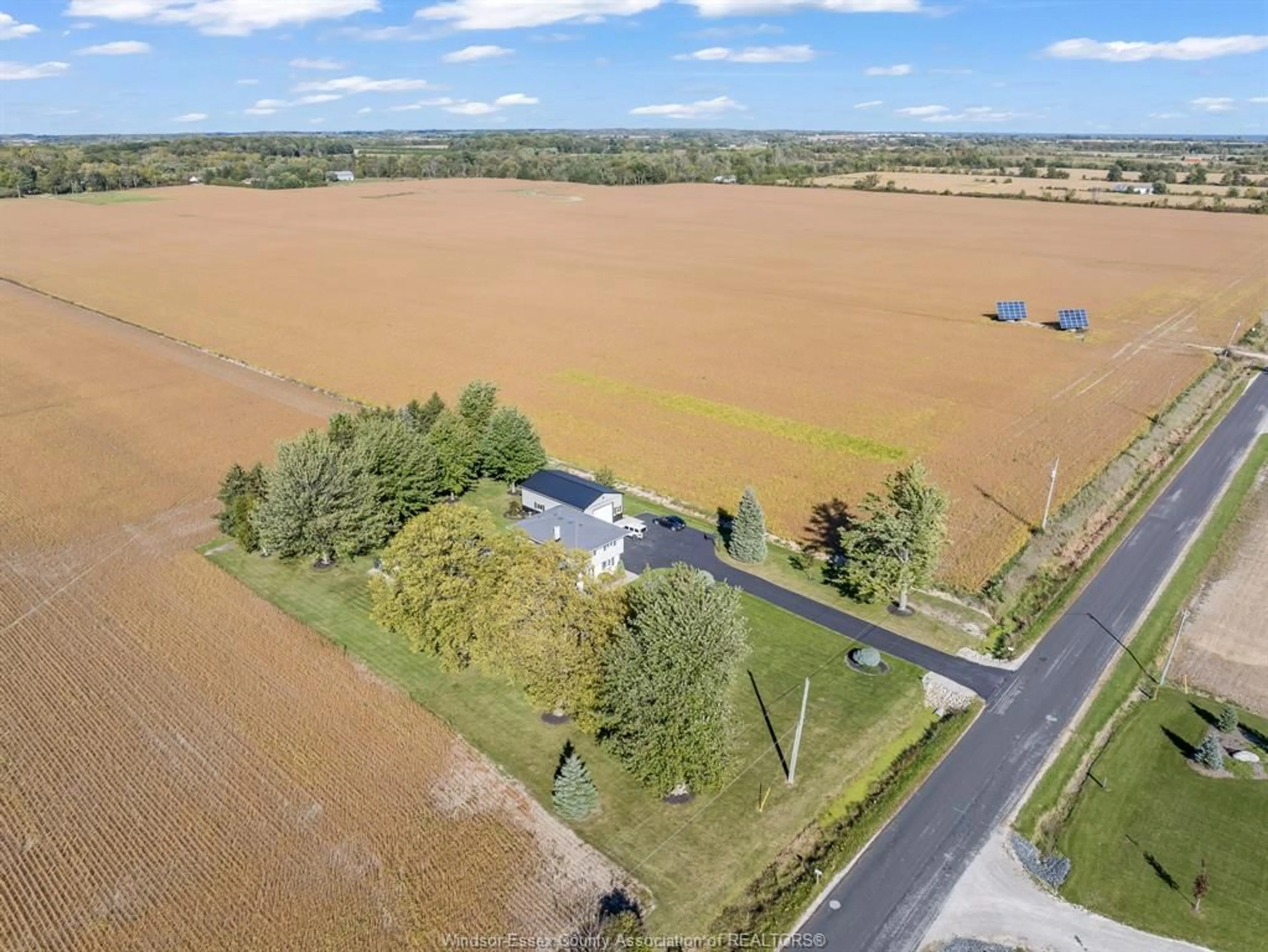 A pic from outside/outdoor area/front of a property/back of a property/a pic from drone, water/lake/river/ocean view for 1539 MERSEA RD 2, Leamington Ontario N8H 3V7