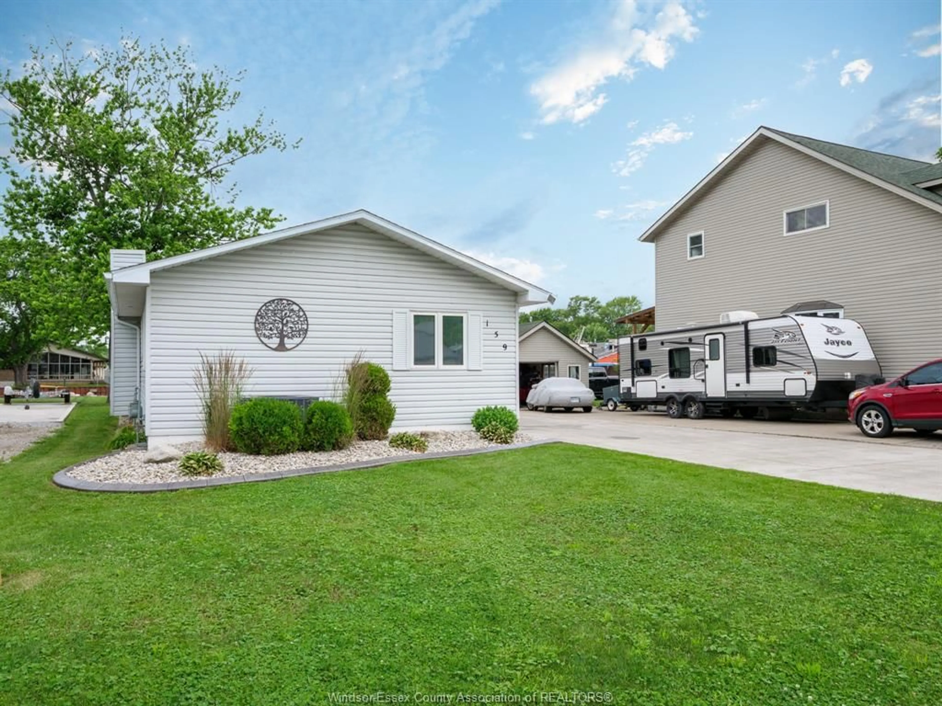 Home with vinyl exterior material, street for 159 EAST PUCE ROAD, Lakeshore Ontario N0R 1A0