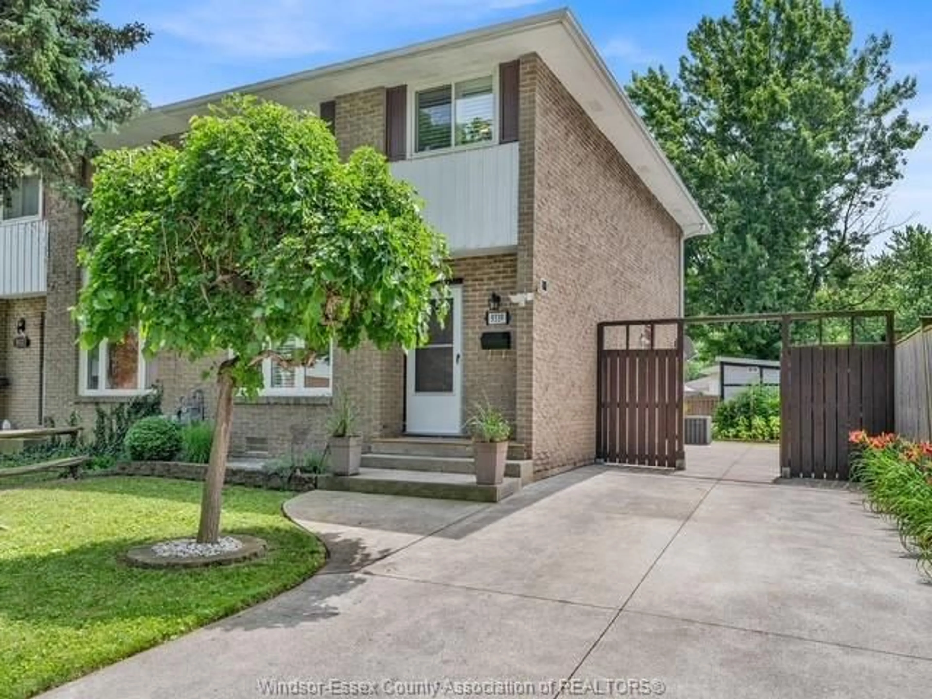 Home with brick exterior material, street for 9339 ALTEN Dr, Windsor Ontario N8R 1V9