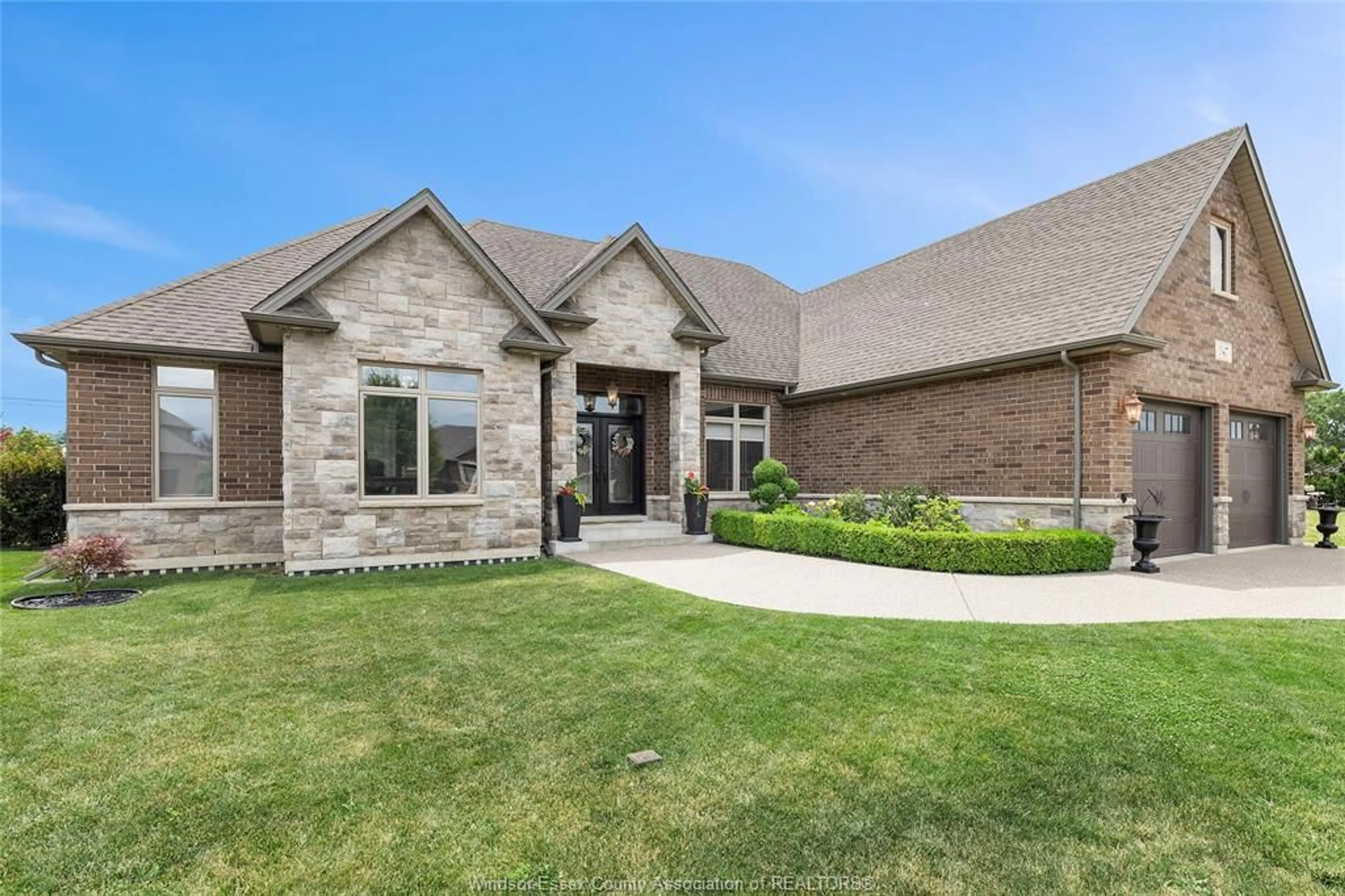 Home with brick exterior material, street for 547 RIVERDOWNS Ave, Lakeshore Ontario N8L 0A2