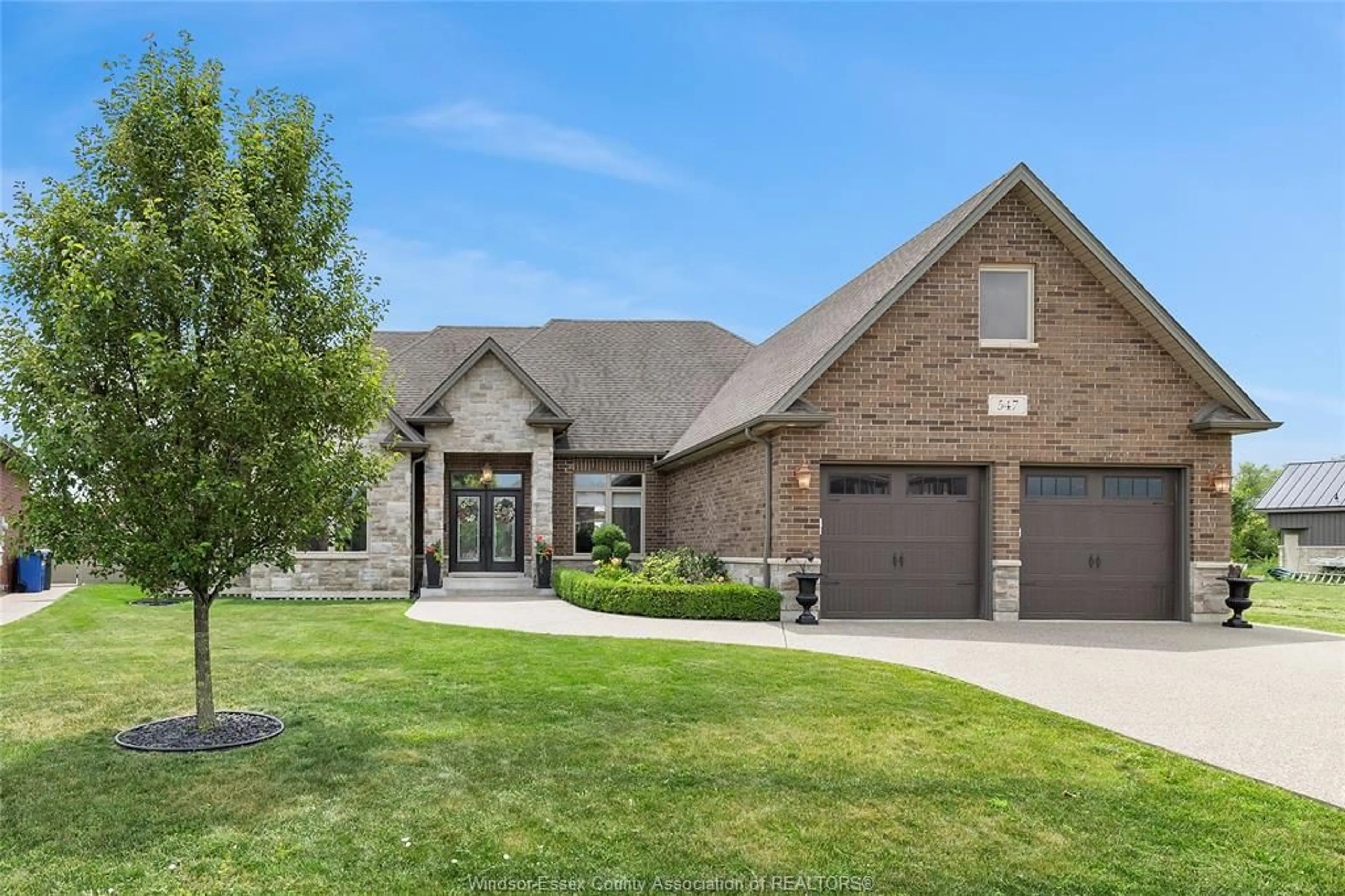 Home with brick exterior material, street for 547 RIVERDOWNS Ave, Lakeshore Ontario N8L 0A2