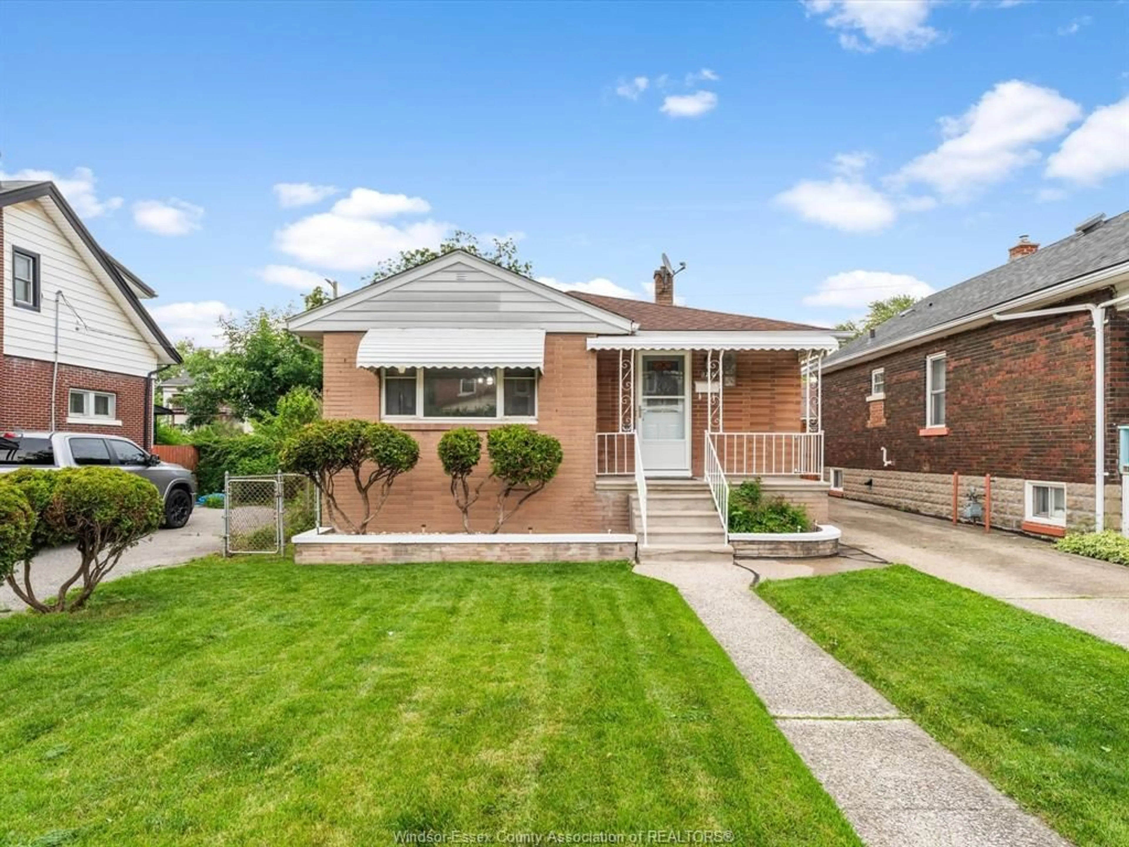 Home with brick exterior material, street for 1310 Dufferin, Windsor Ontario N8X 3K1