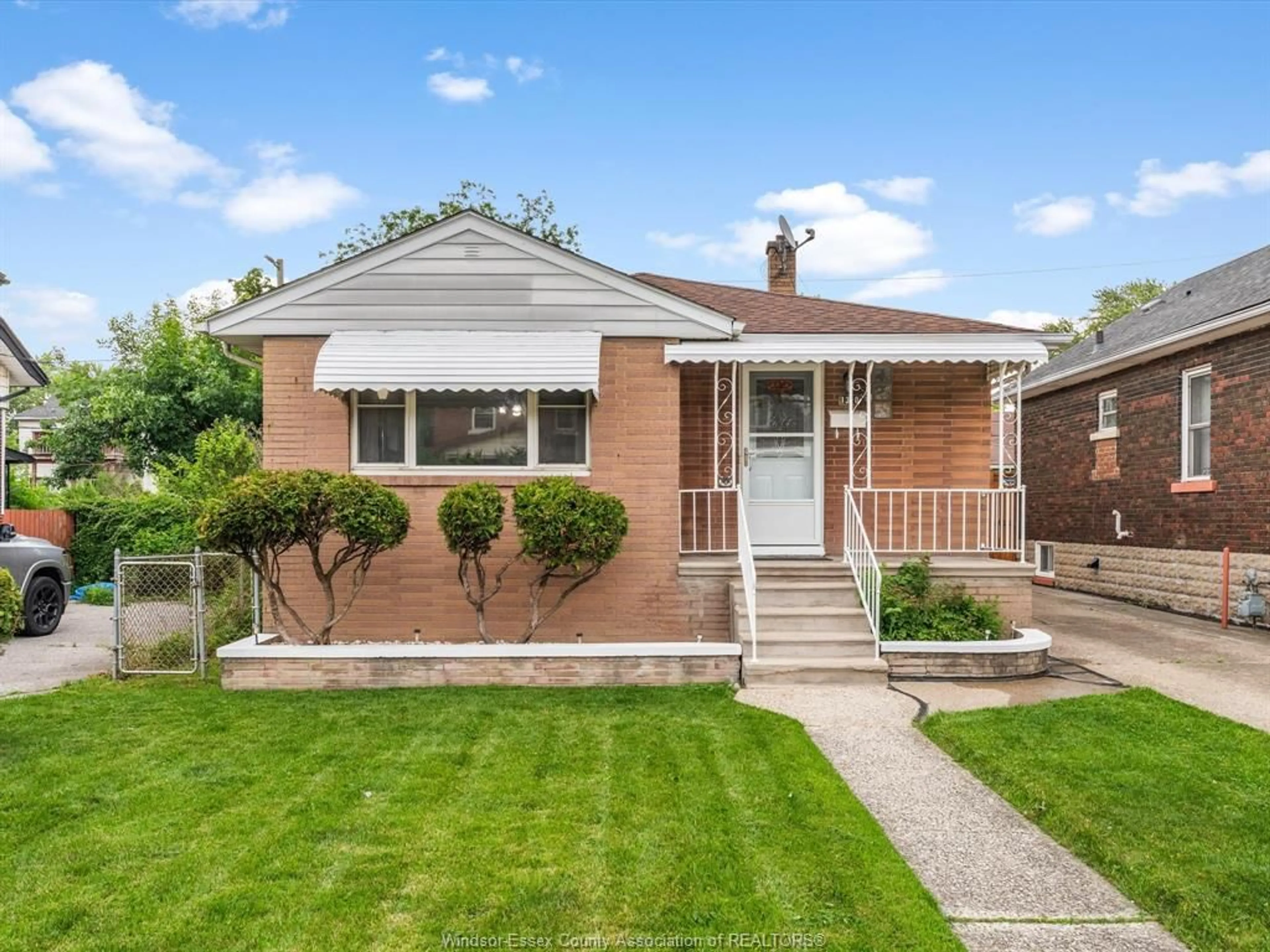 Home with brick exterior material, street for 1310 Dufferin, Windsor Ontario N8X 3K1