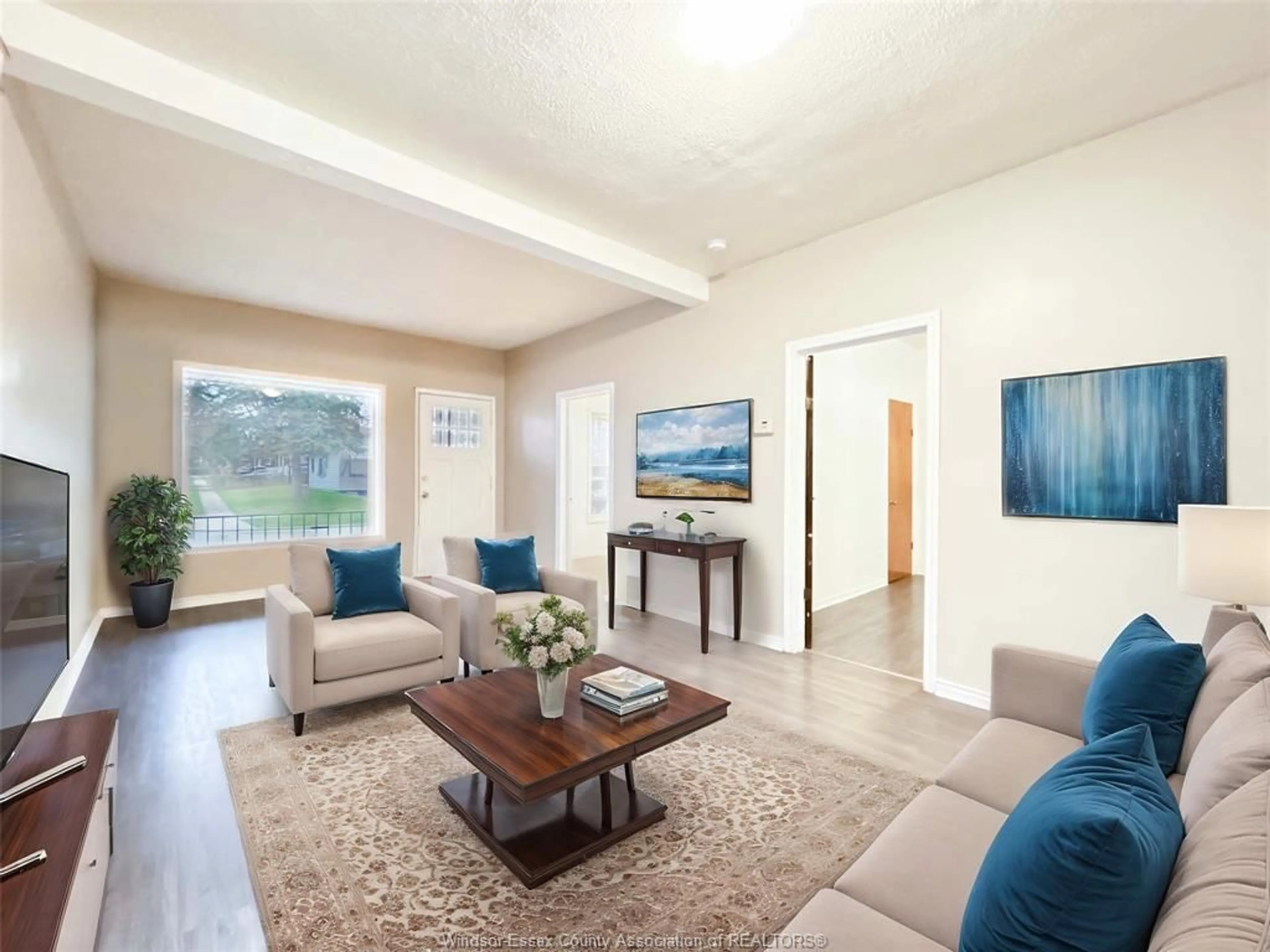 Living room with furniture, unknown for 3168 WYANDOTTE St, Windsor Ontario N9C 1M6