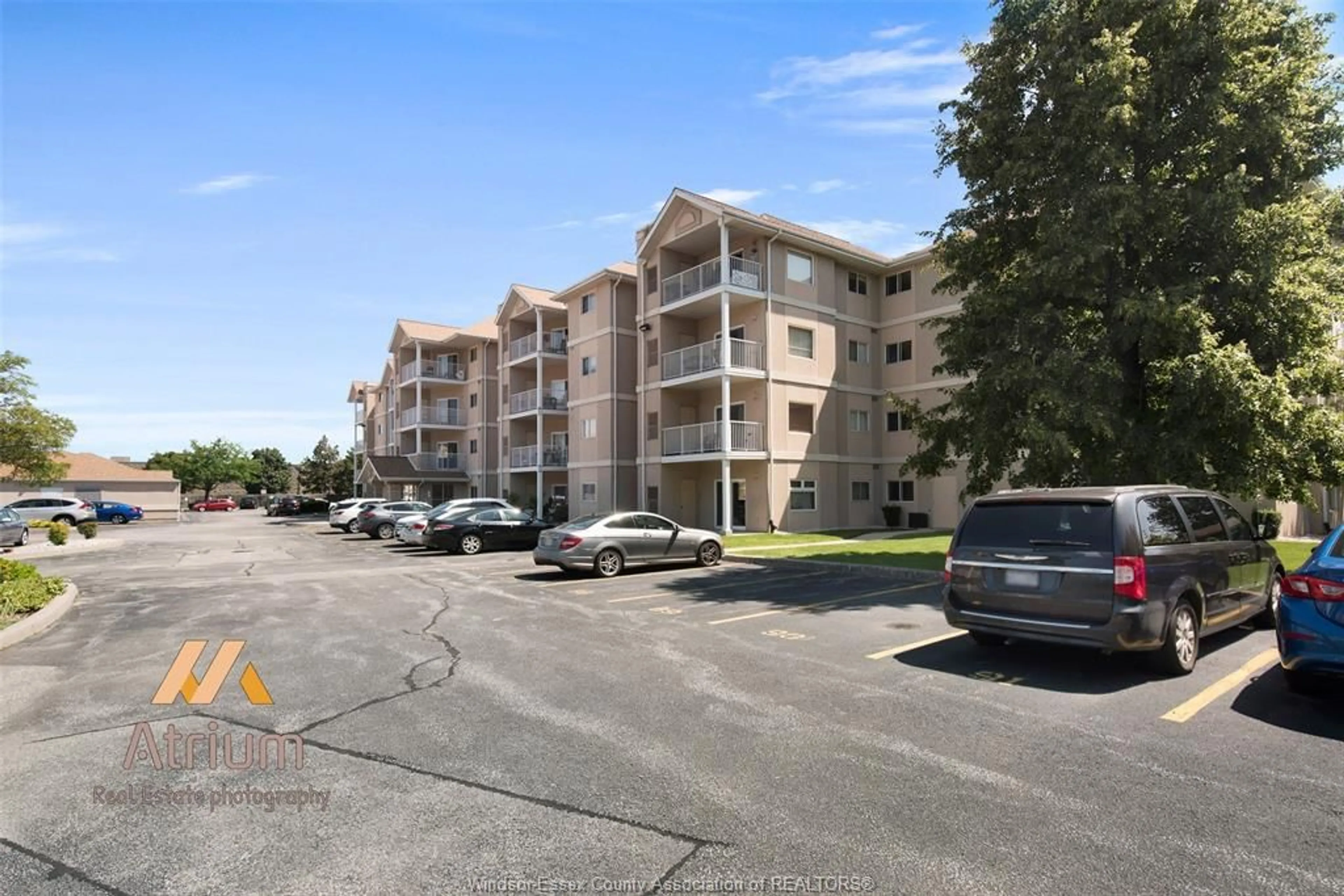 A pic from outside/outdoor area/front of a property/back of a property/a pic from drone, unknown for 1547 GRAND MARAIS Rd #411, Windsor Ontario N9E 4W3