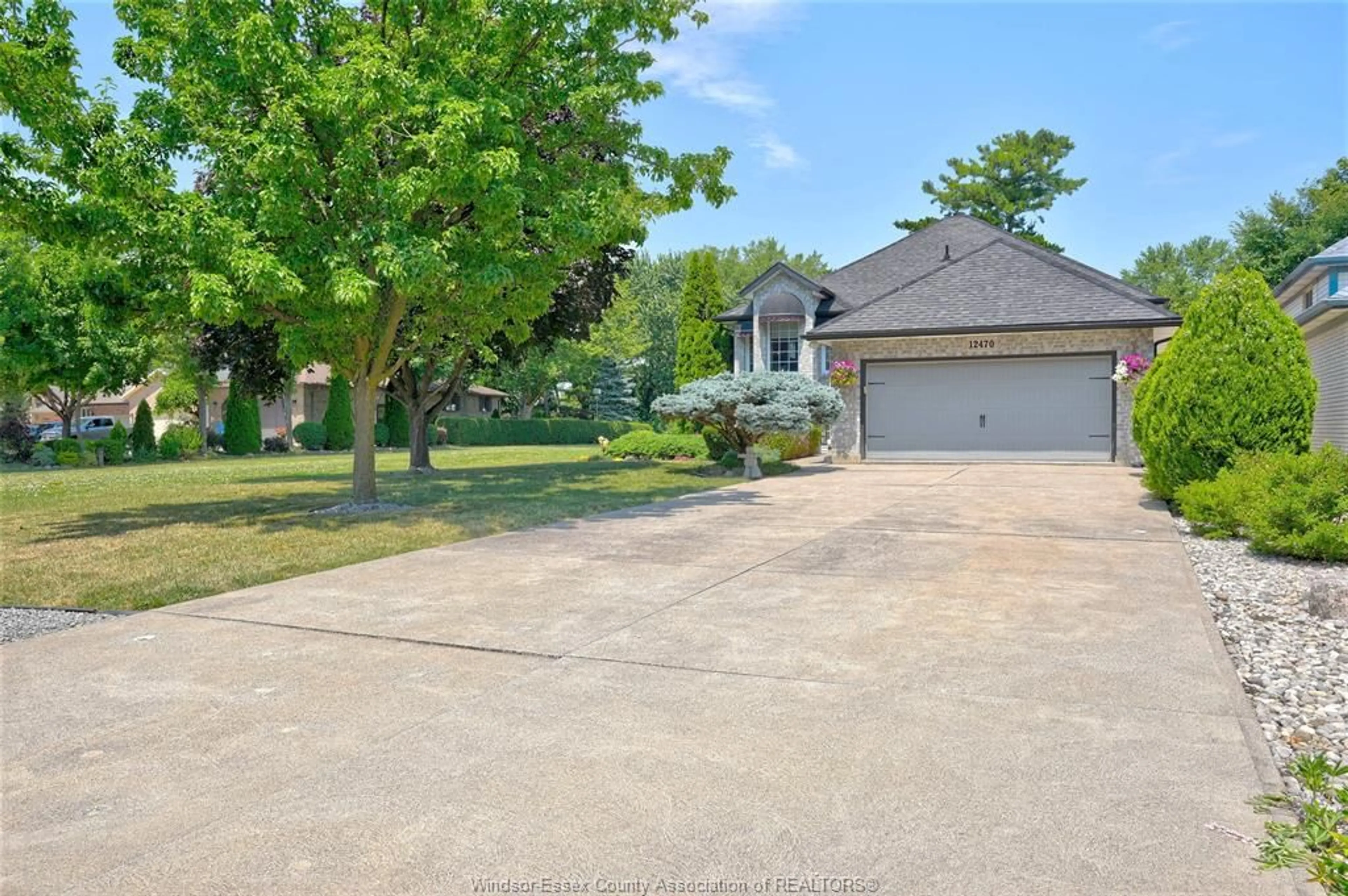 A pic from outside/outdoor area/front of a property/back of a property/a pic from drone, water/lake/river/ocean view for 12470 LITTLE RIVER, Tecumseh Ontario N8N 4V4