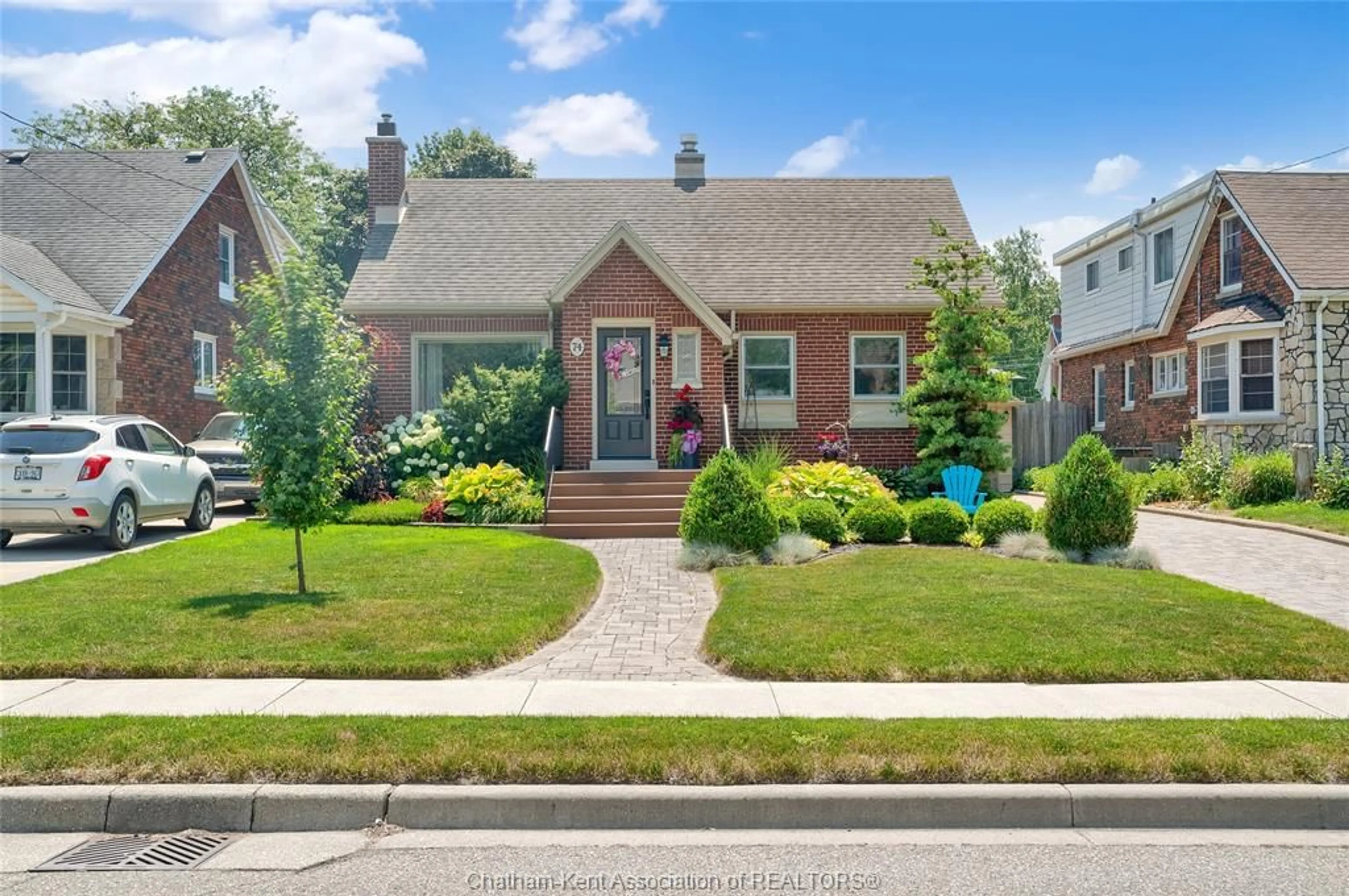 Home with brick exterior material, street for 74 Phyllis Ave, Chatham Ontario N7M 3C3