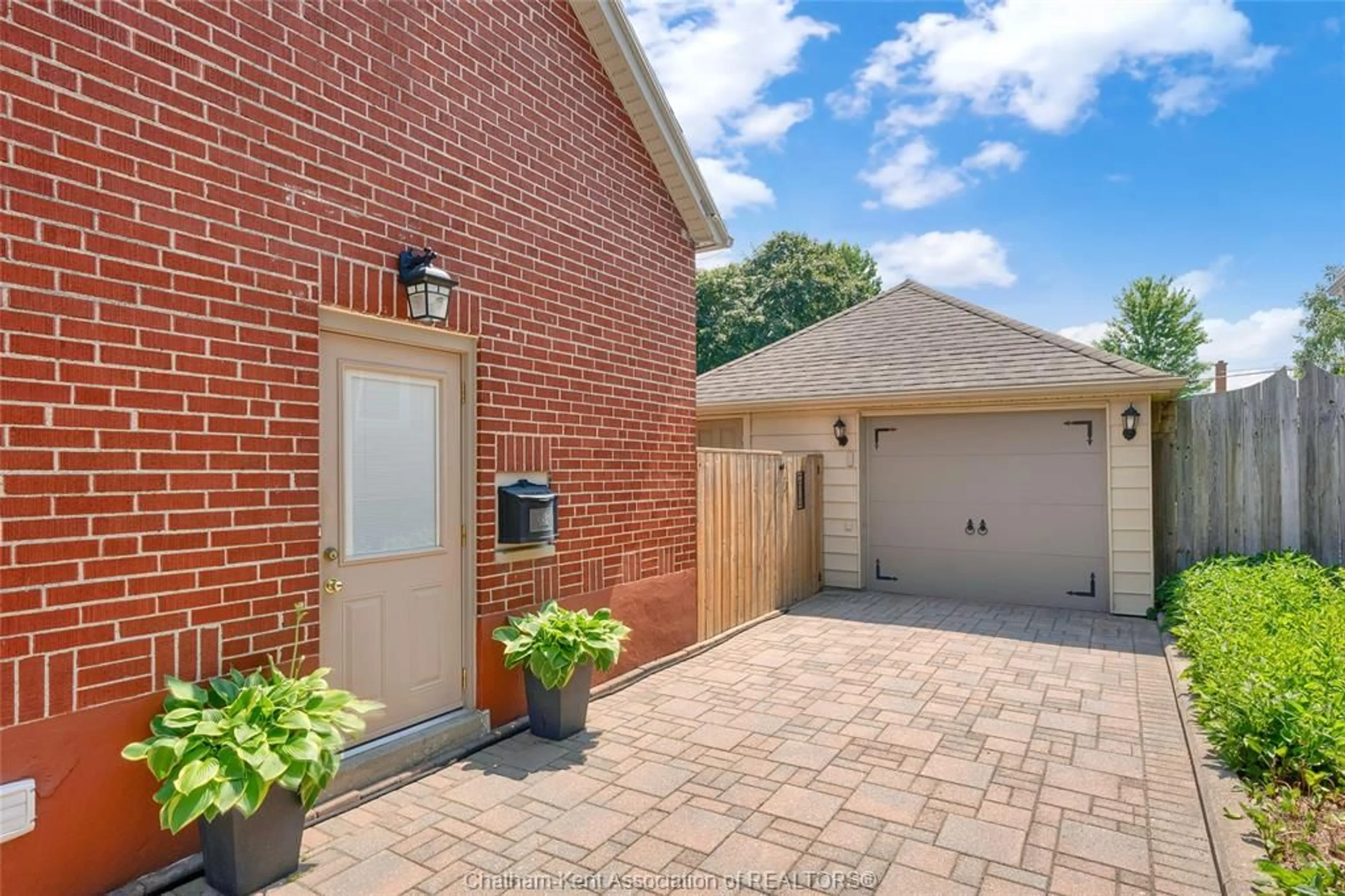 Home with brick exterior material, street for 74 Phyllis Ave, Chatham Ontario N7M 3C3