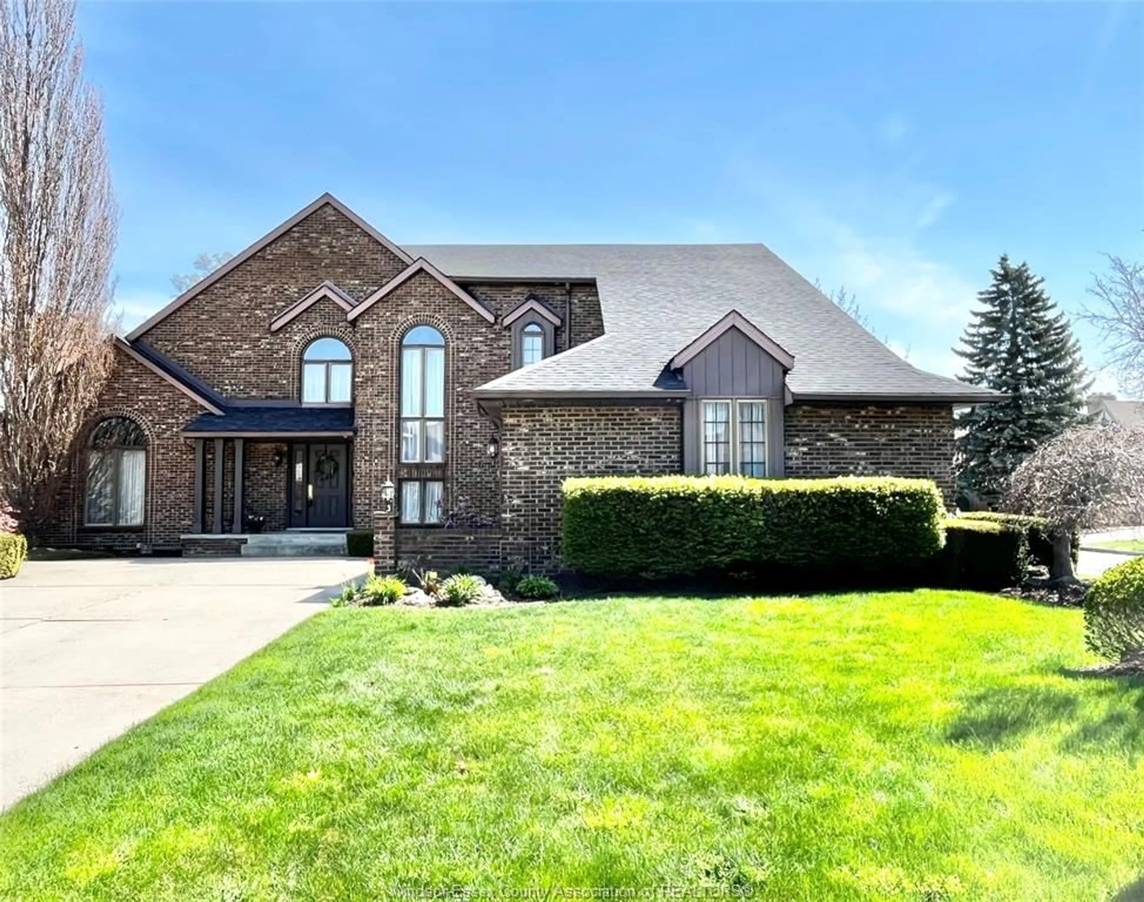 Home with brick exterior material, street for 3940 VILLA BORGHESE Dr, Windsor Ontario N9E 2K4