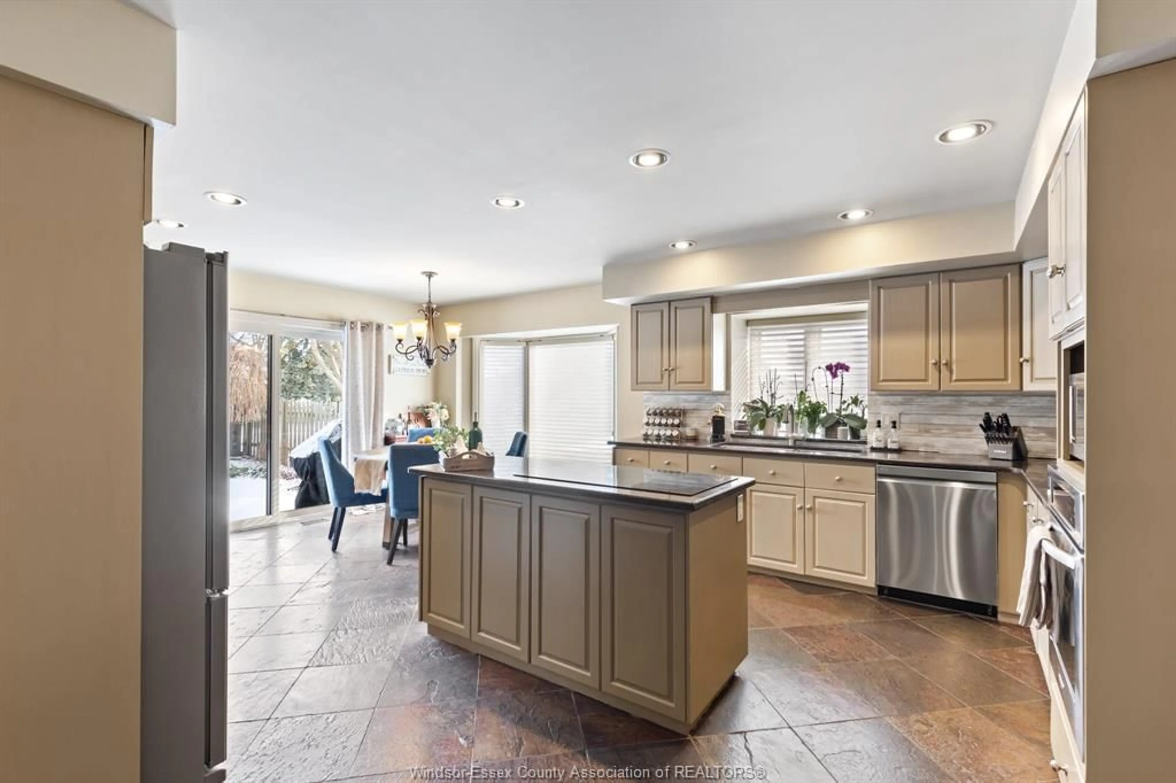Open concept kitchen, ceramic/tile floor for 3940 VILLA BORGHESE Dr, Windsor Ontario N9E 2K4