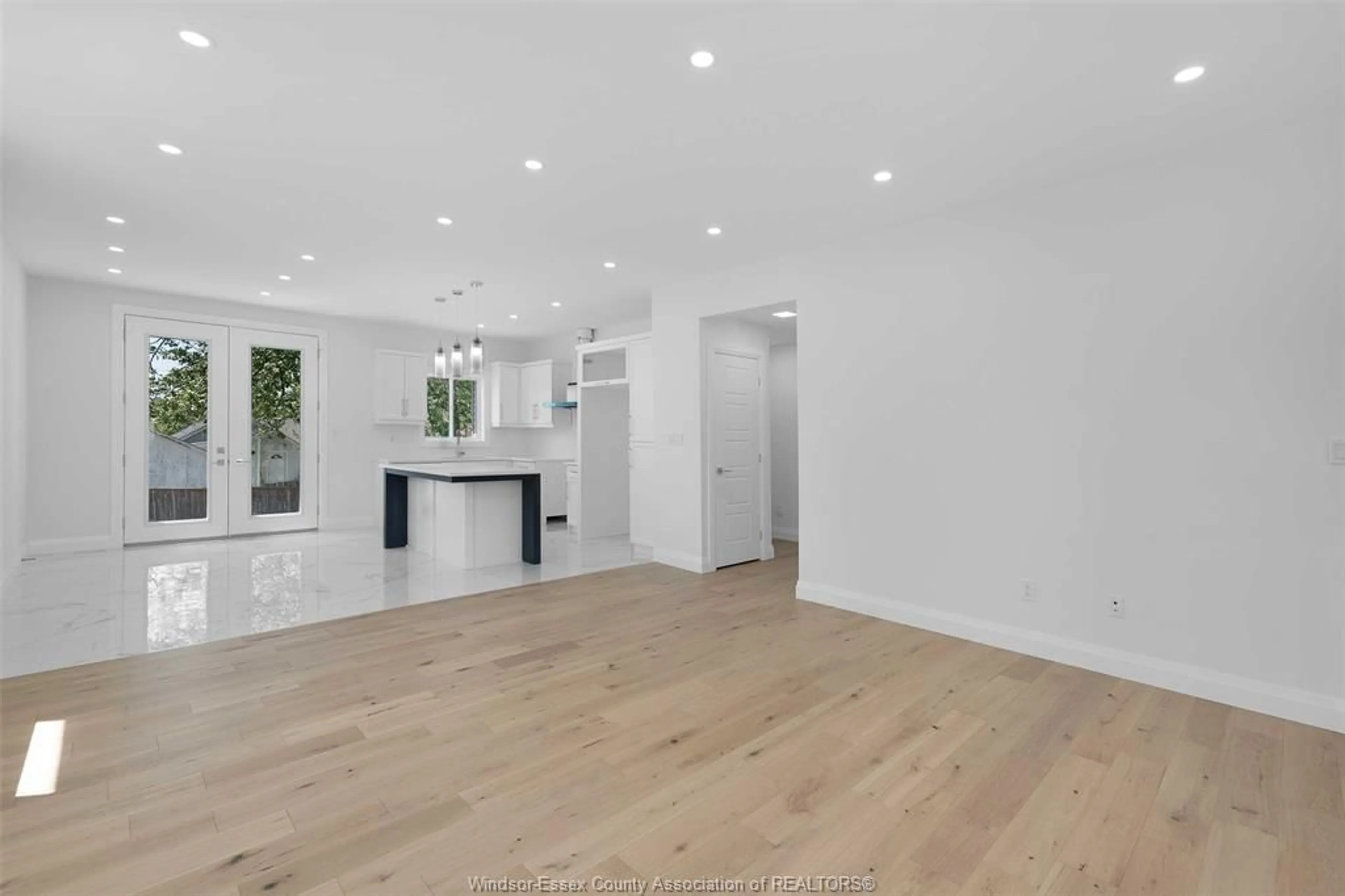 Open concept kitchen, wood/laminate floor for 8328 ANNIE, McGregor Ontario N0R 1J0