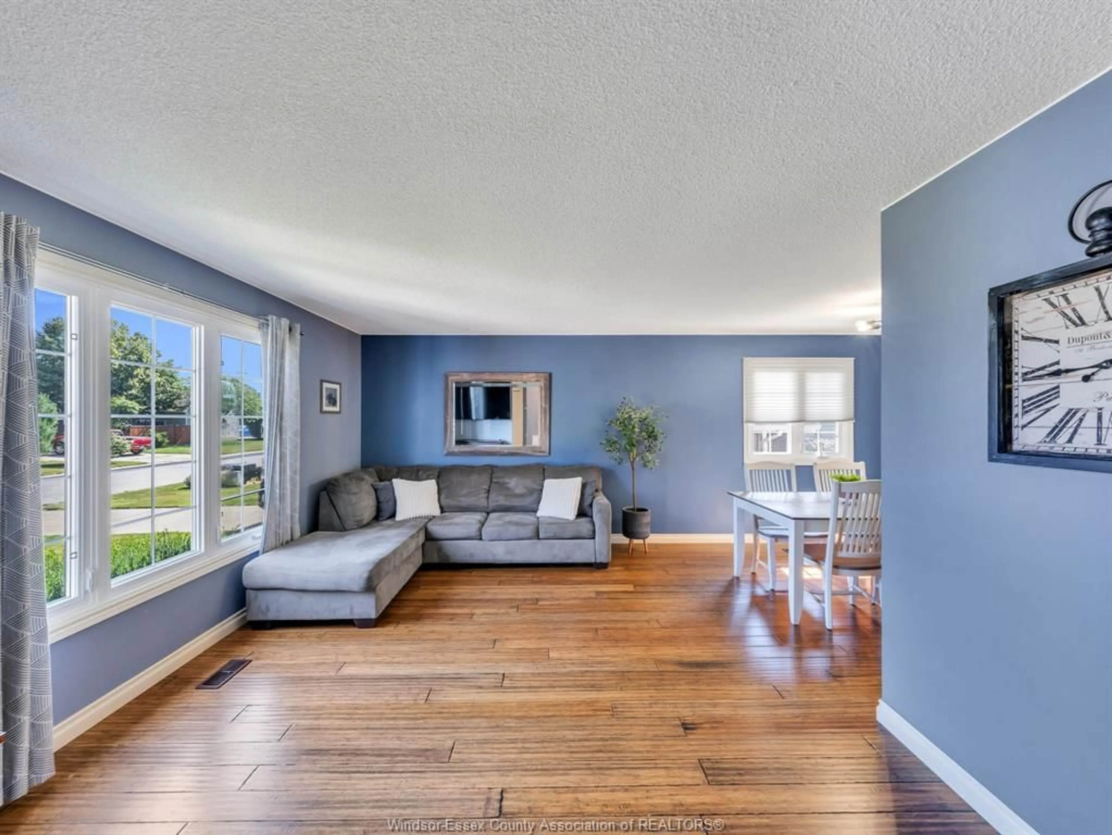 Living room with furniture, wood/laminate floor for 185 PURPLE PLUM DRIVE, Kingsville Ontario N9Y 3P5