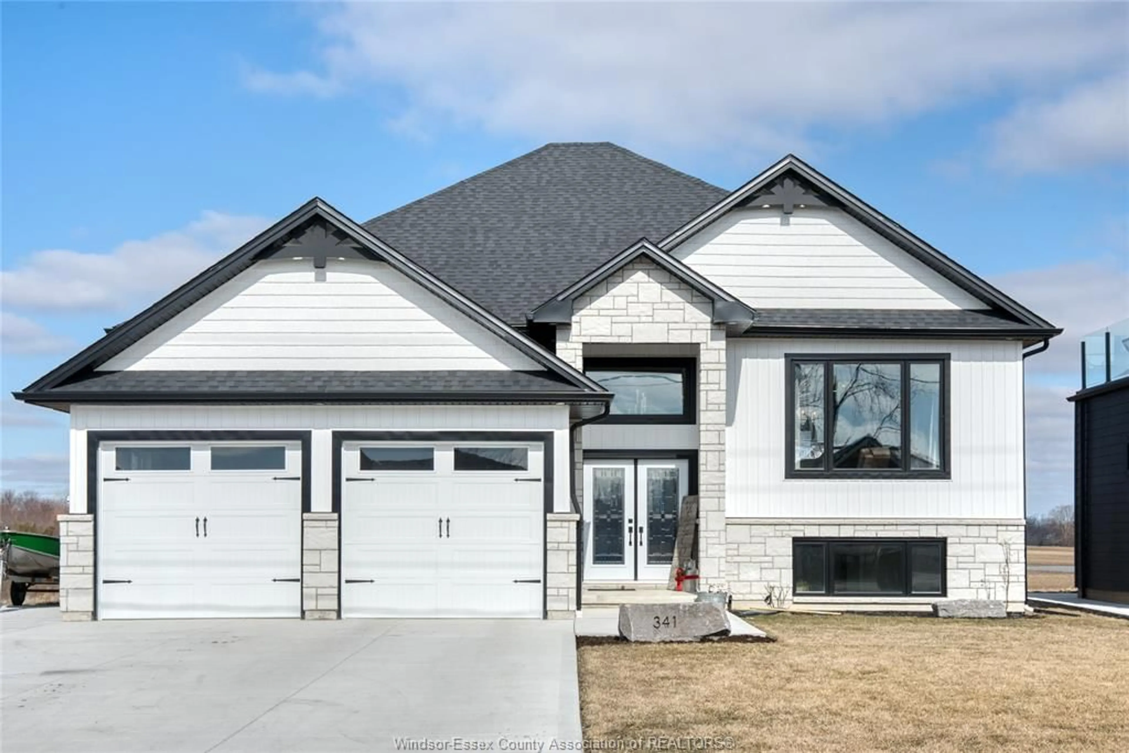 Home with brick exterior material, street for 341 Concession Line 1, Wheatley Ontario N0P 2P0