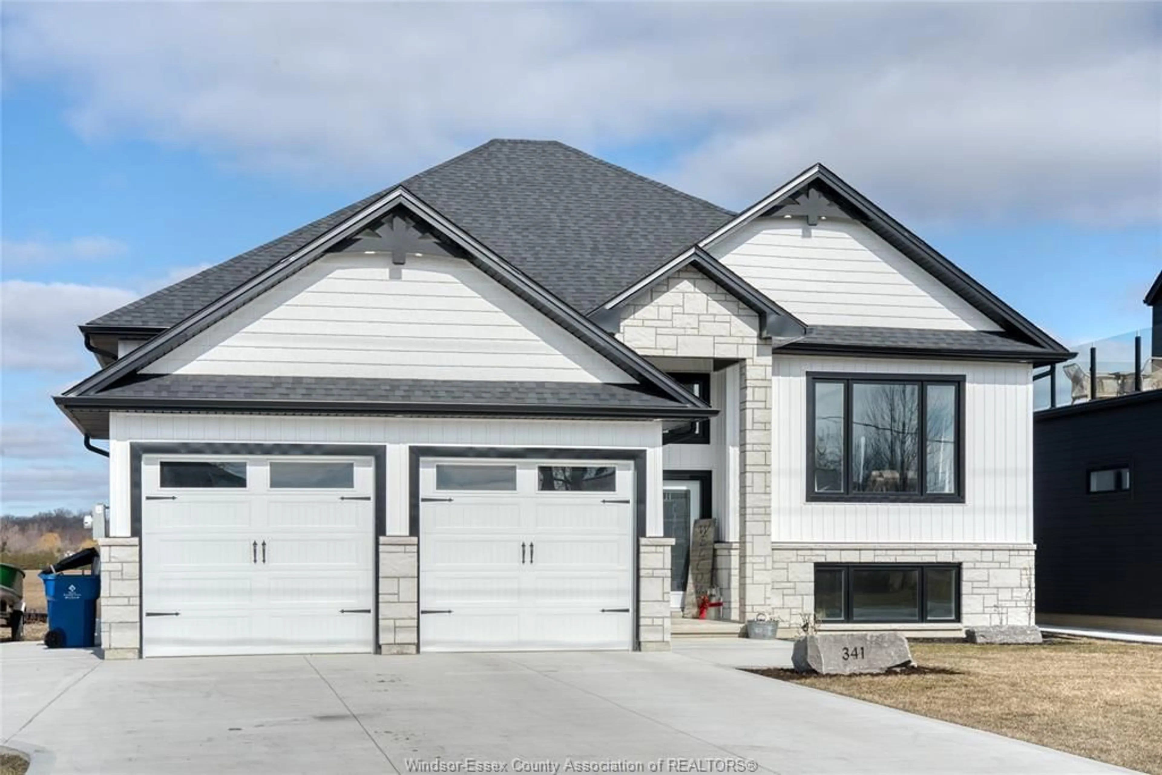 Home with vinyl exterior material, street for 341 Concession Line 1, Wheatley Ontario N0P 2P0