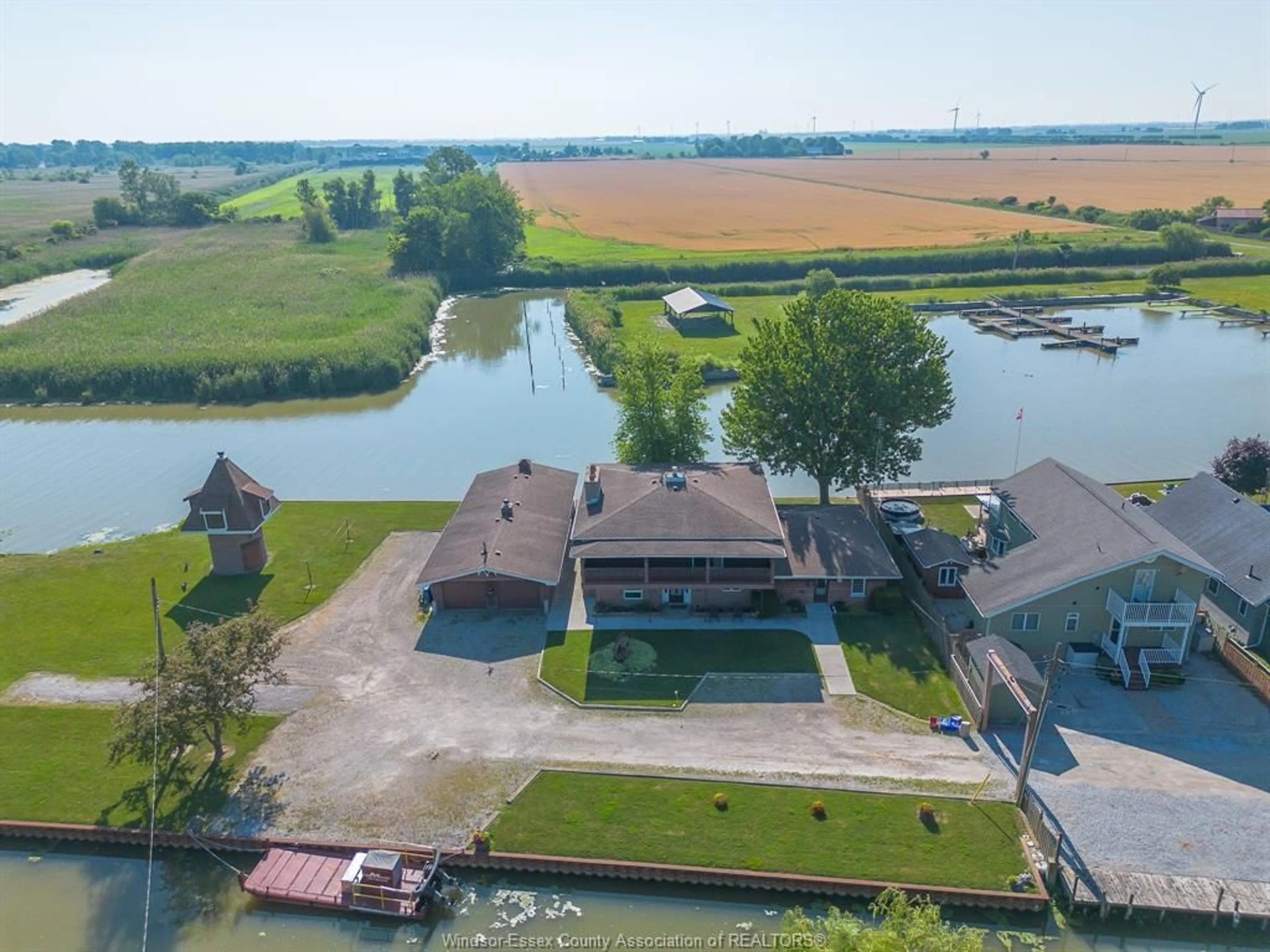 A pic from outside/outdoor area/front of a property/back of a property/a pic from drone, water/lake/river/ocean view for 194 RIVERSIDE Rd, Lakeshore Ontario N0R 1A0